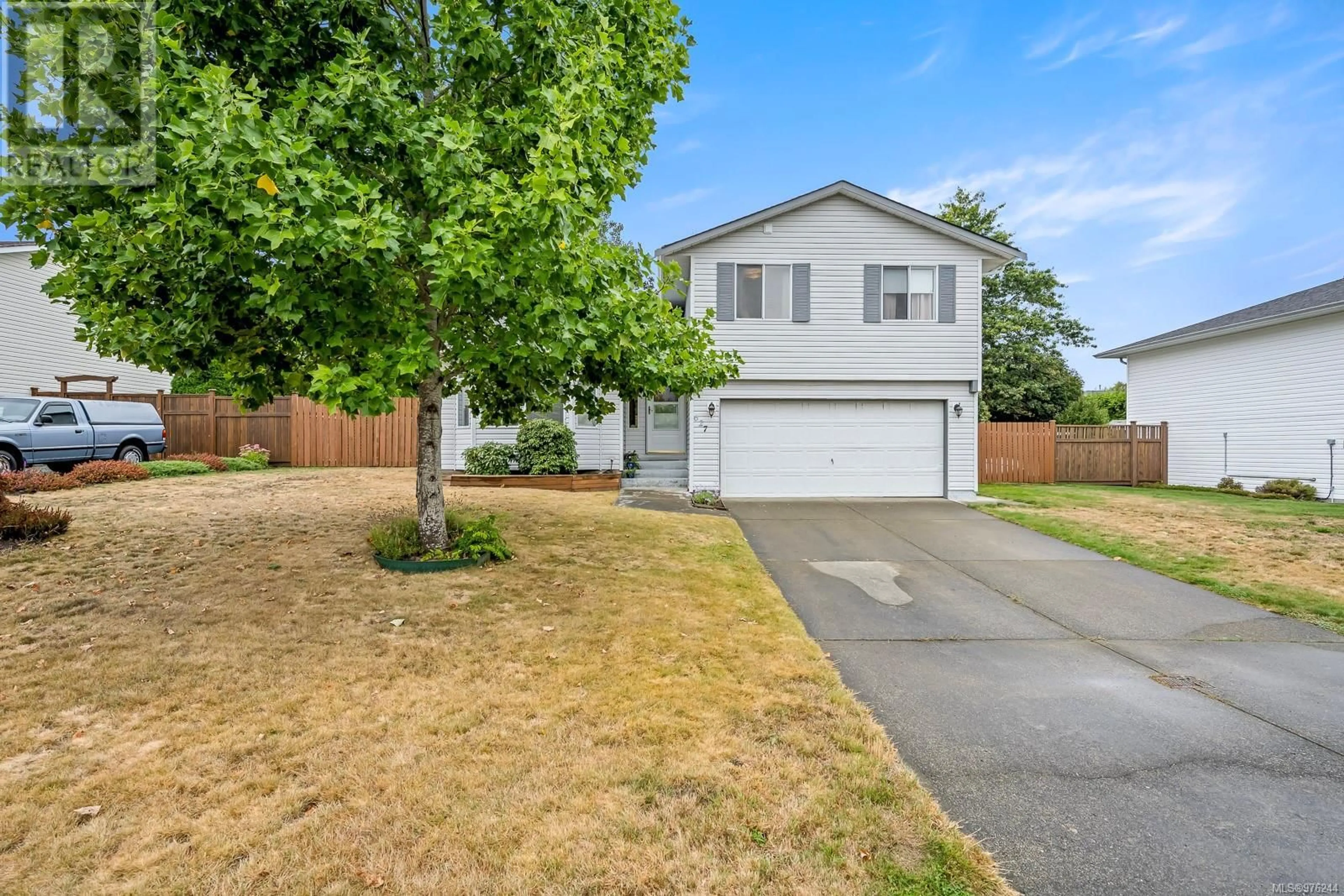 Frontside or backside of a home, the fenced backyard for 627 CORMORANT St, Comox British Columbia V9M3P1