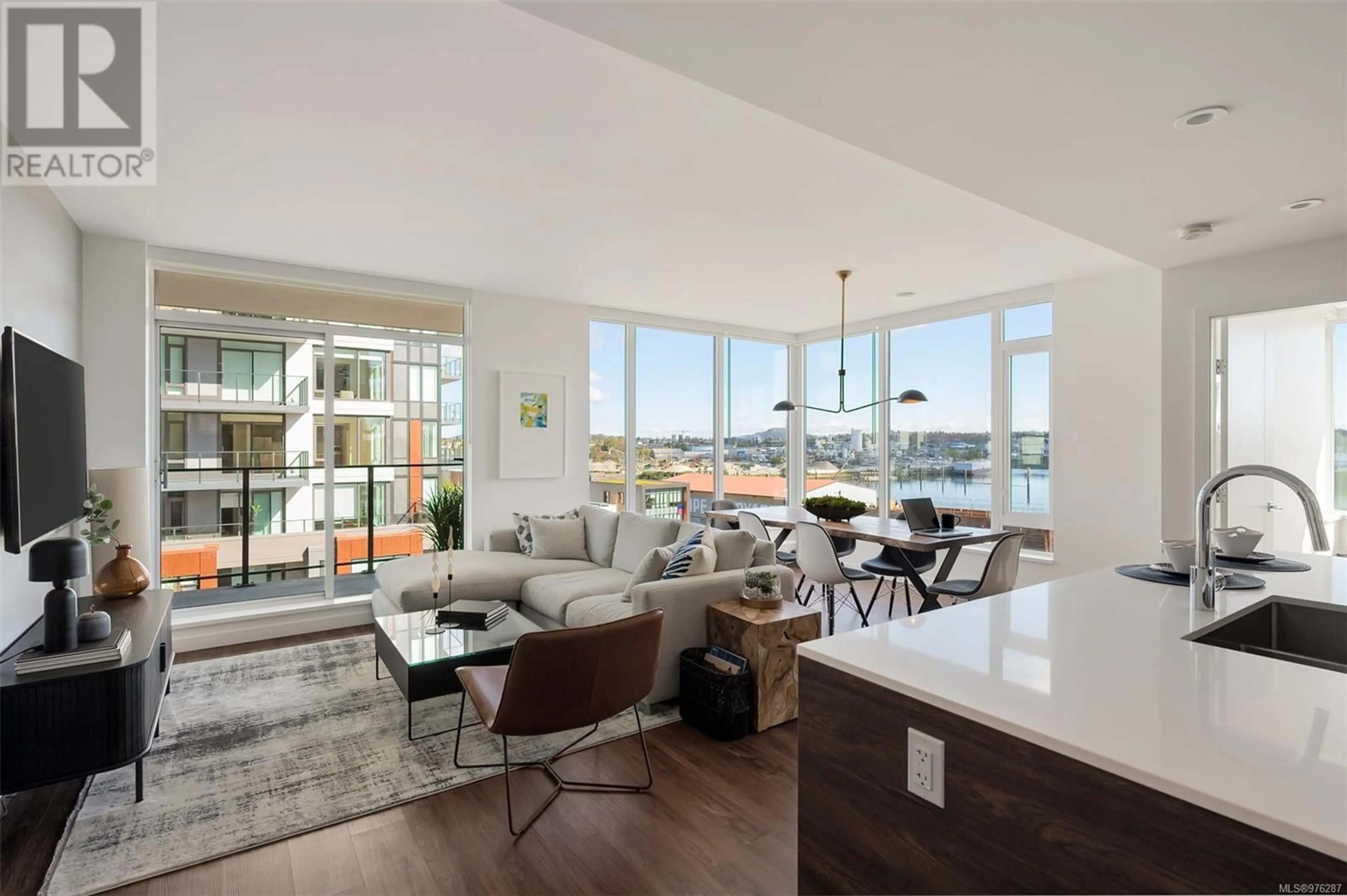 Living room, wood floors for 407 363 Tyee Rd, Victoria British Columbia V9A0B5