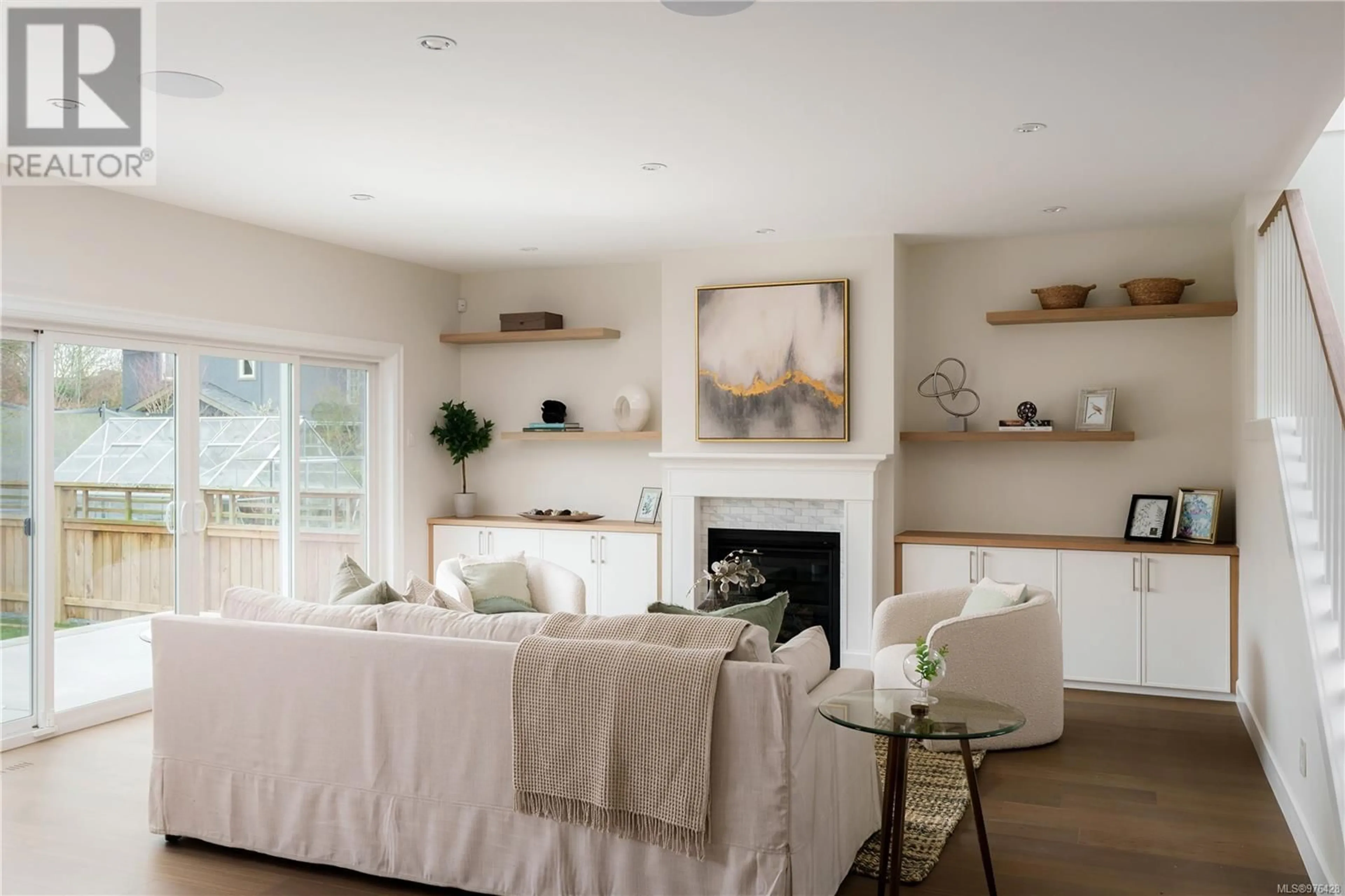 Living room with furniture, wood/laminate floor for 1749 Fairfield Rd, Victoria British Columbia V8S1G6