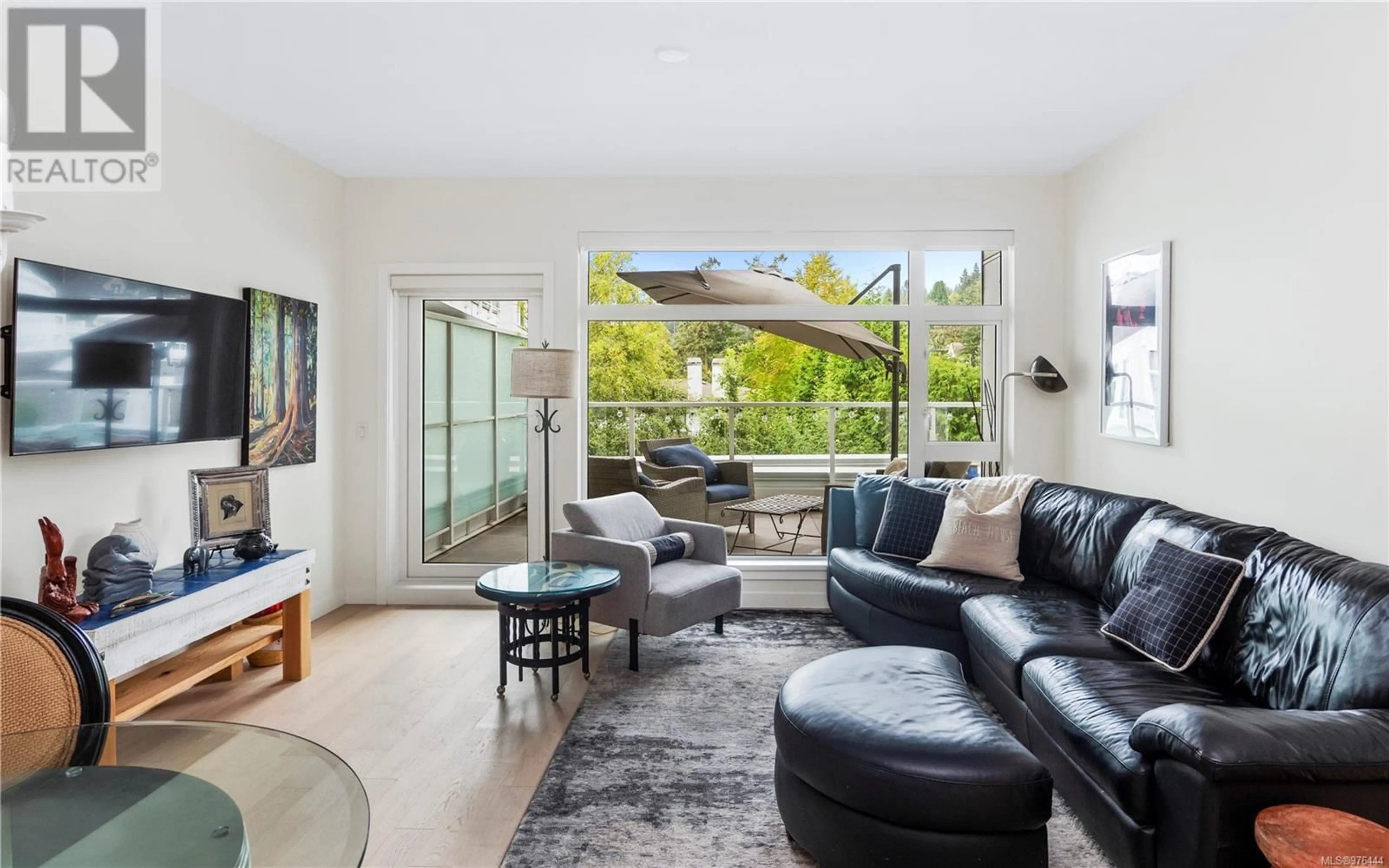 Living room, wood floors for 211 5120 Cordova Bay Rd, Saanich British Columbia V8Y2K1