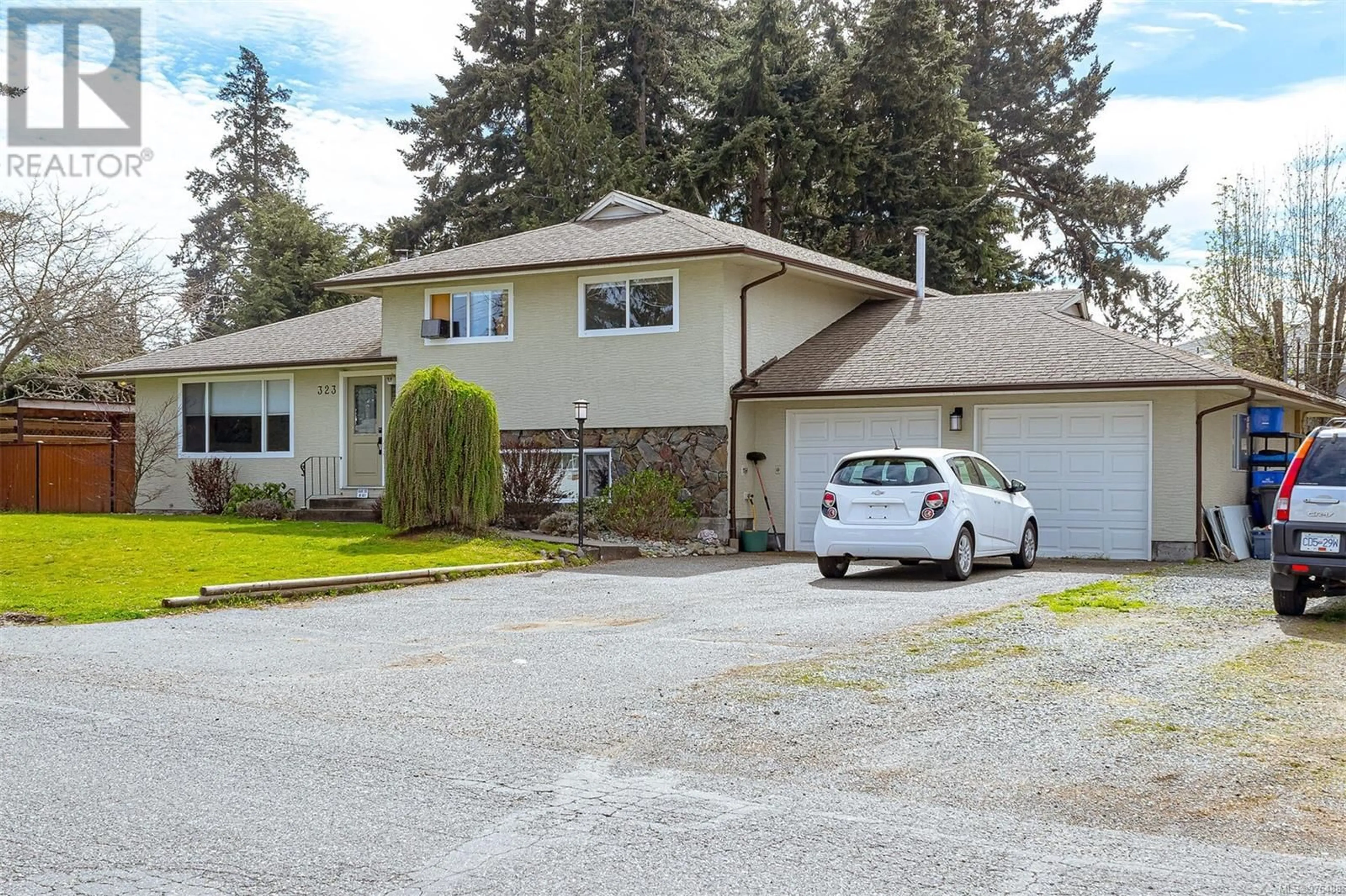 Frontside or backside of a home, cottage for 323 Benhomer Dr, Colwood British Columbia V9C2C8