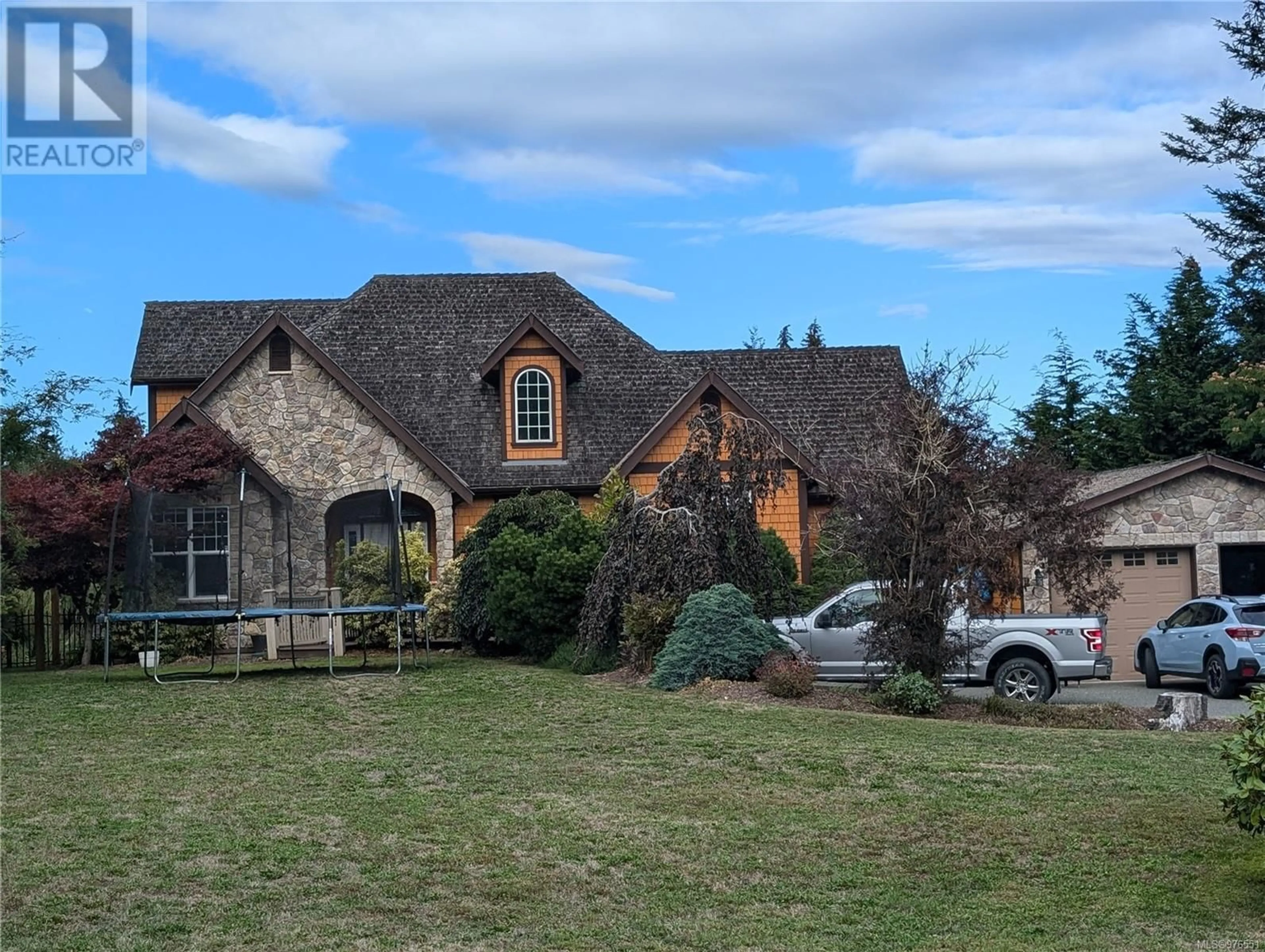 Frontside or backside of a home, cottage for 4696 Montrose Dr, Courtenay British Columbia V9N9S8