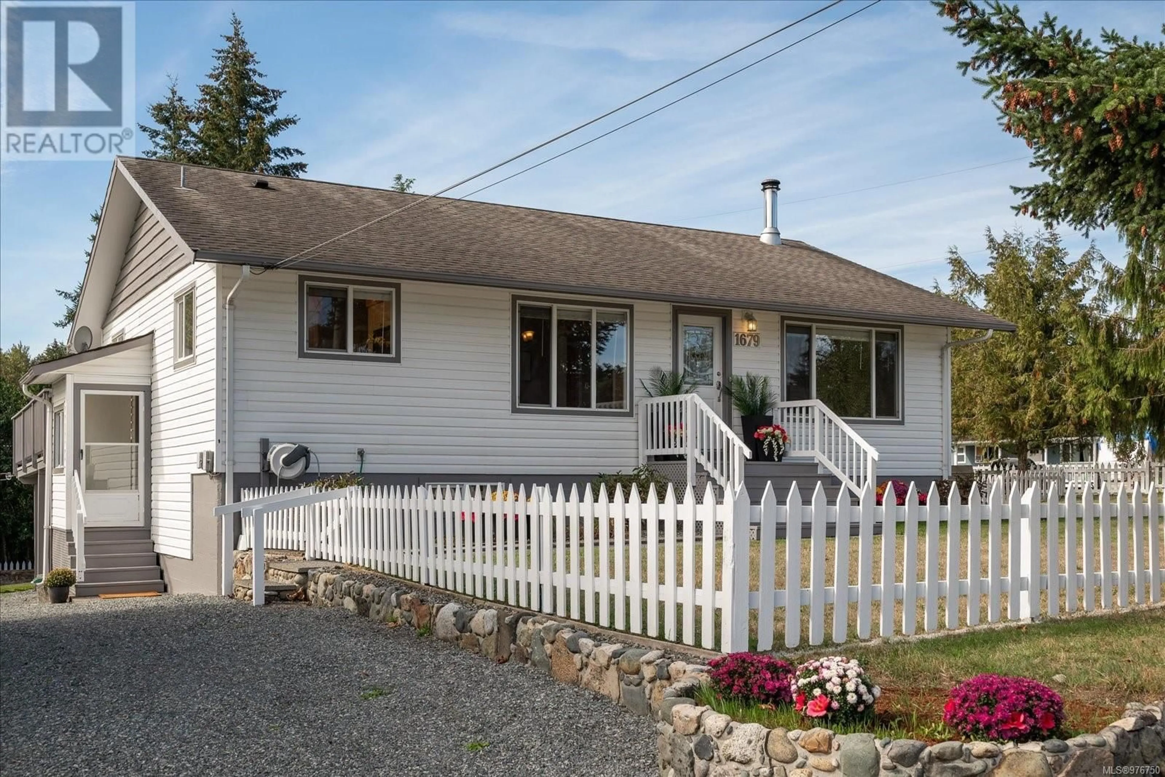 Frontside or backside of a home for 1679 Cedar Rd, Nanaimo British Columbia V9X1L4