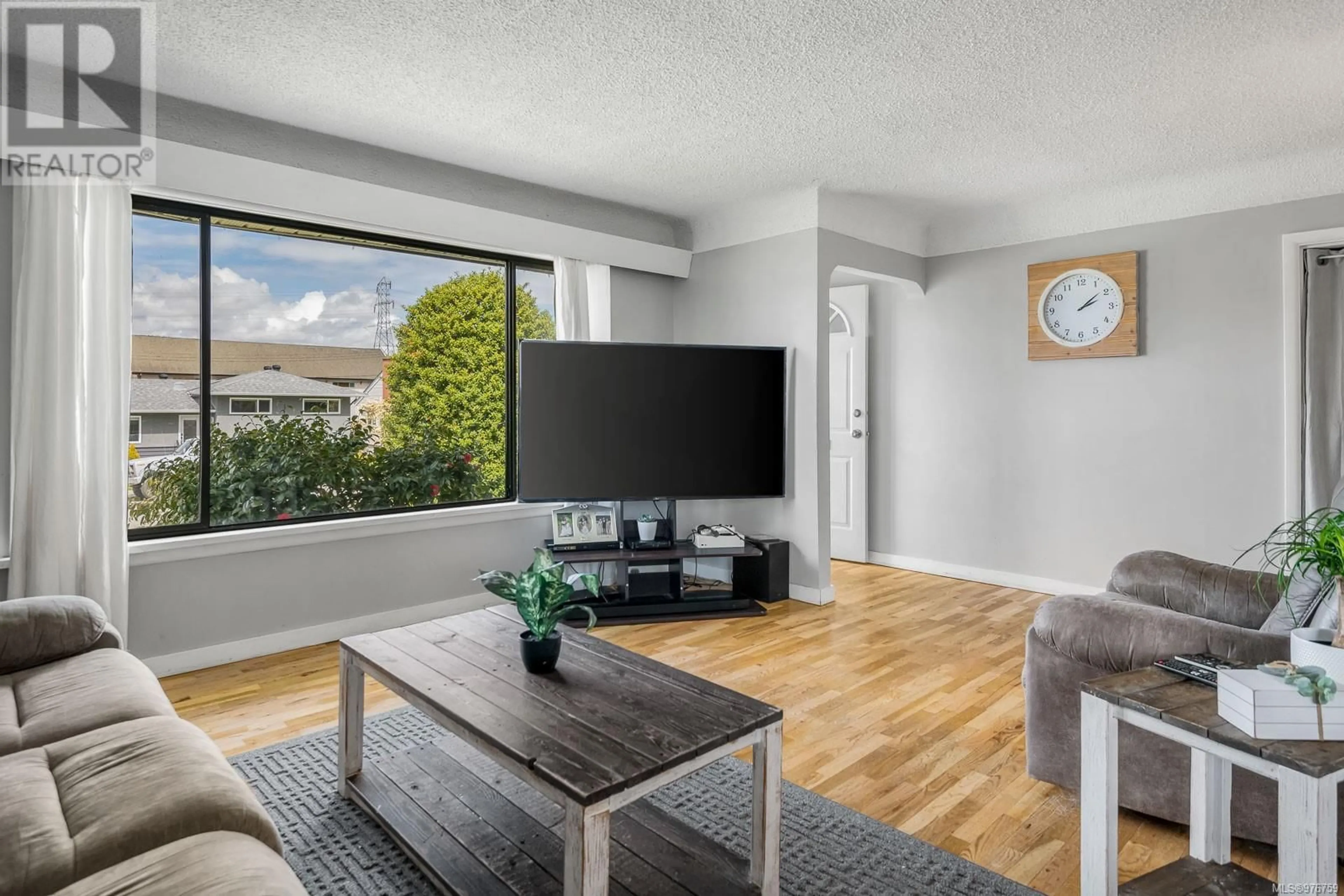 Media room, wood floors for 3944 Exton St, Port Alberni British Columbia V9Y3X7