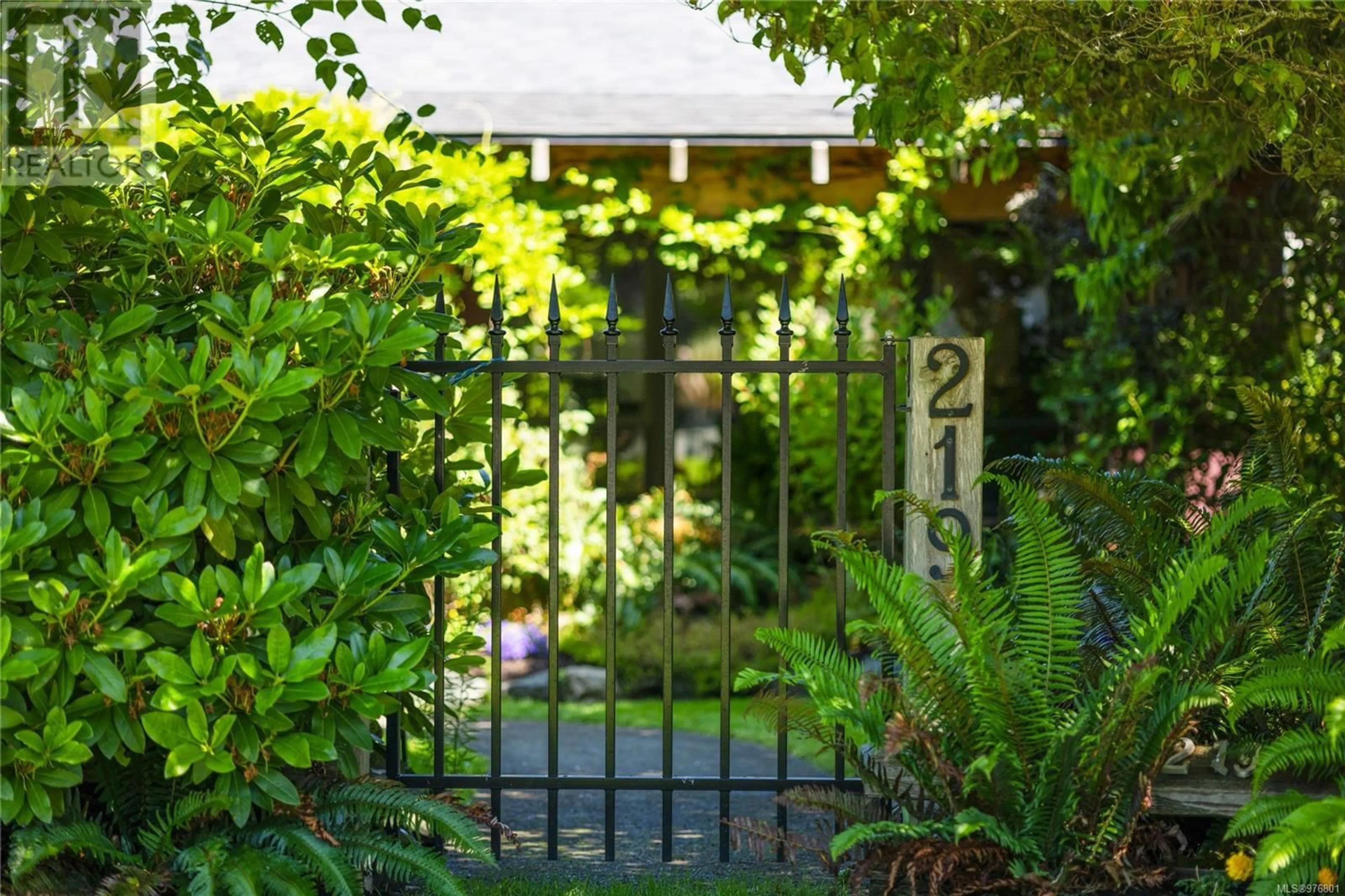 Patio, the fenced backyard for 219 Hoylake Rd E, Qualicum Beach British Columbia V9K1L5