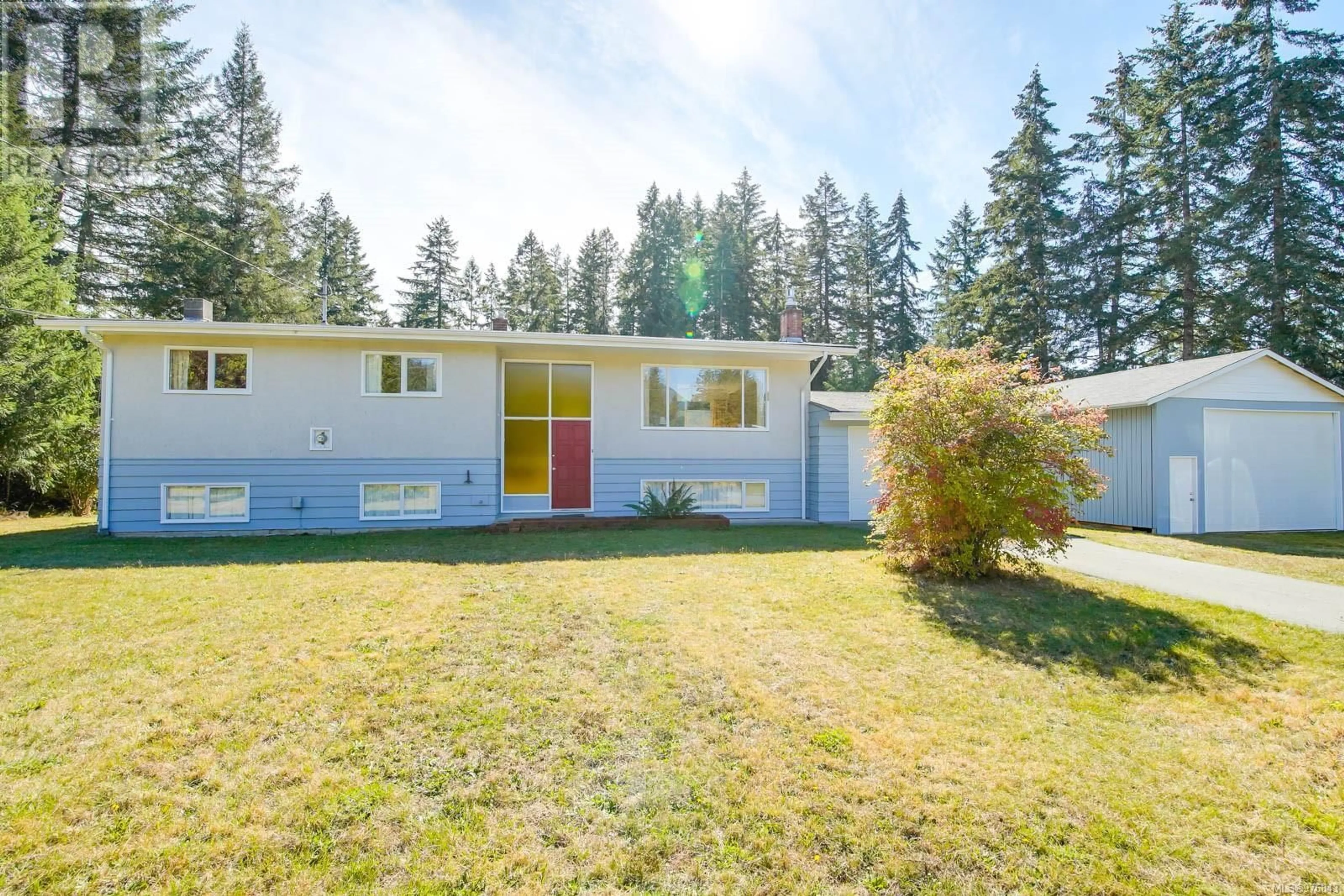 Frontside or backside of a home, the fenced backyard for 6012 Wadena Rd, Port Alberni British Columbia V9Y8X1