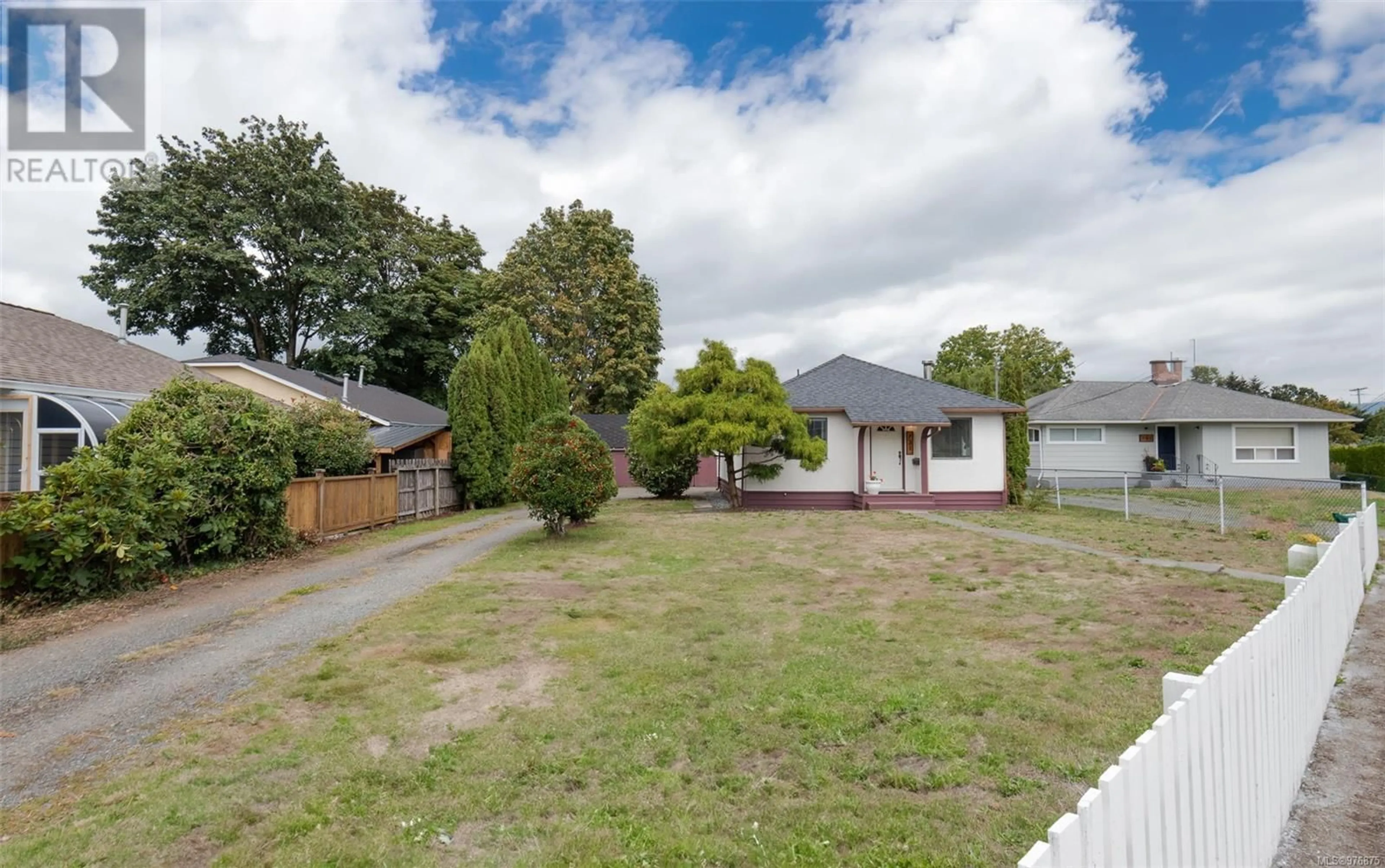 Frontside or backside of a home, the fenced backyard for 731 Trunk Rd, Duncan British Columbia V9L2R5