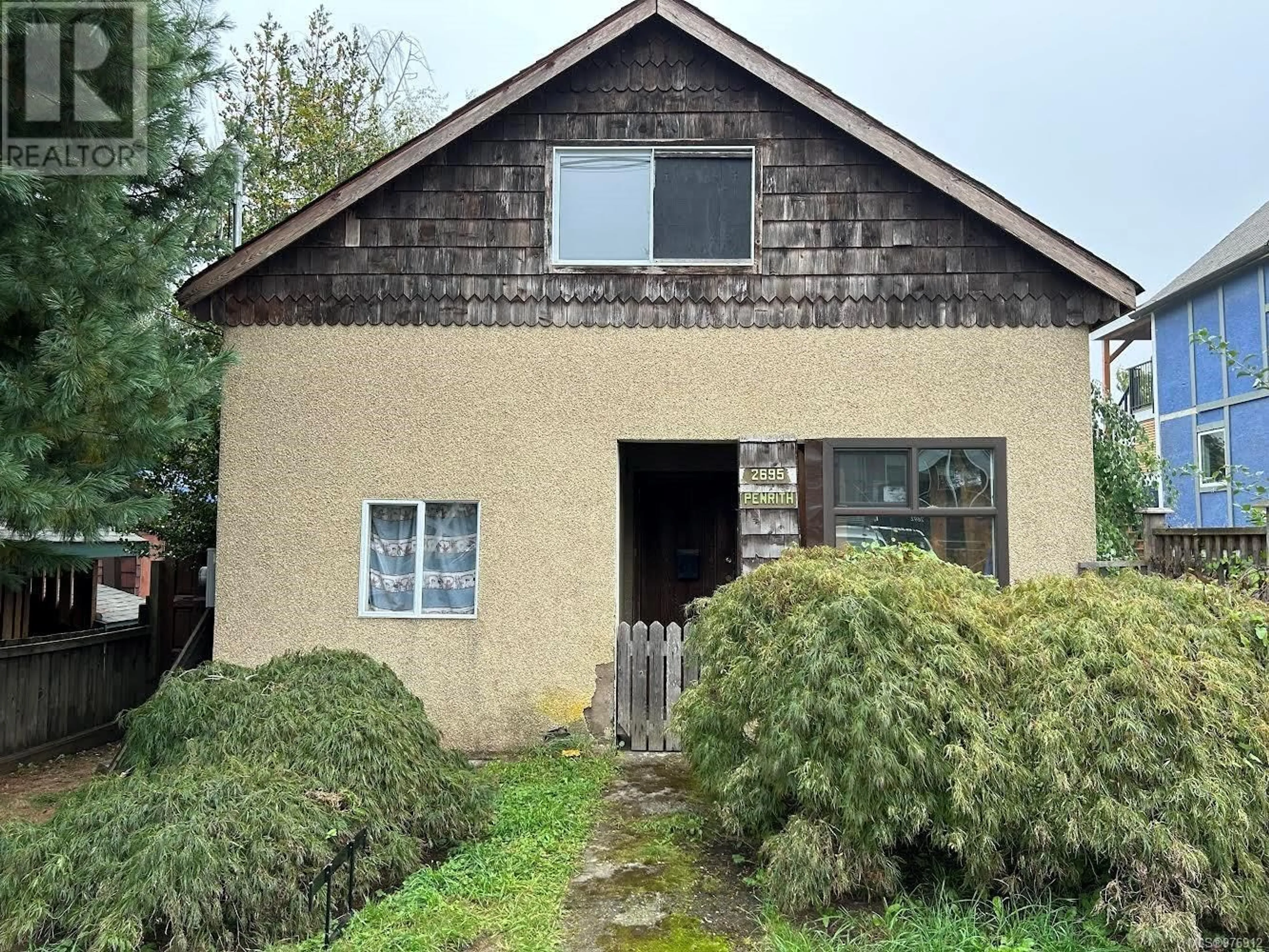 Frontside or backside of a home, cottage for 2695 Penrith Ave, Cumberland British Columbia V0R1S0