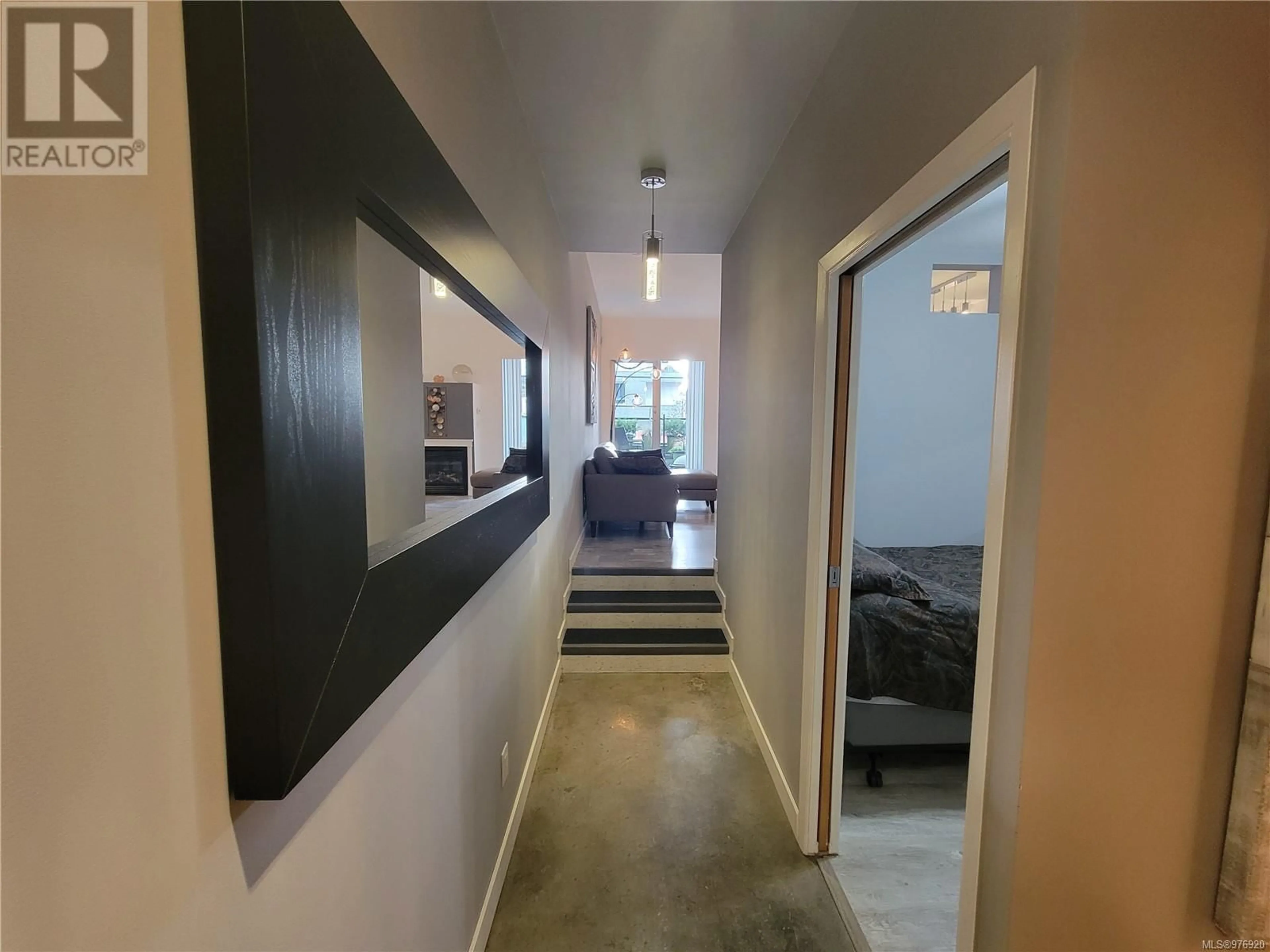 Indoor entryway, cement floor for 110 932 Johnson St, Victoria British Columbia V8V3W3