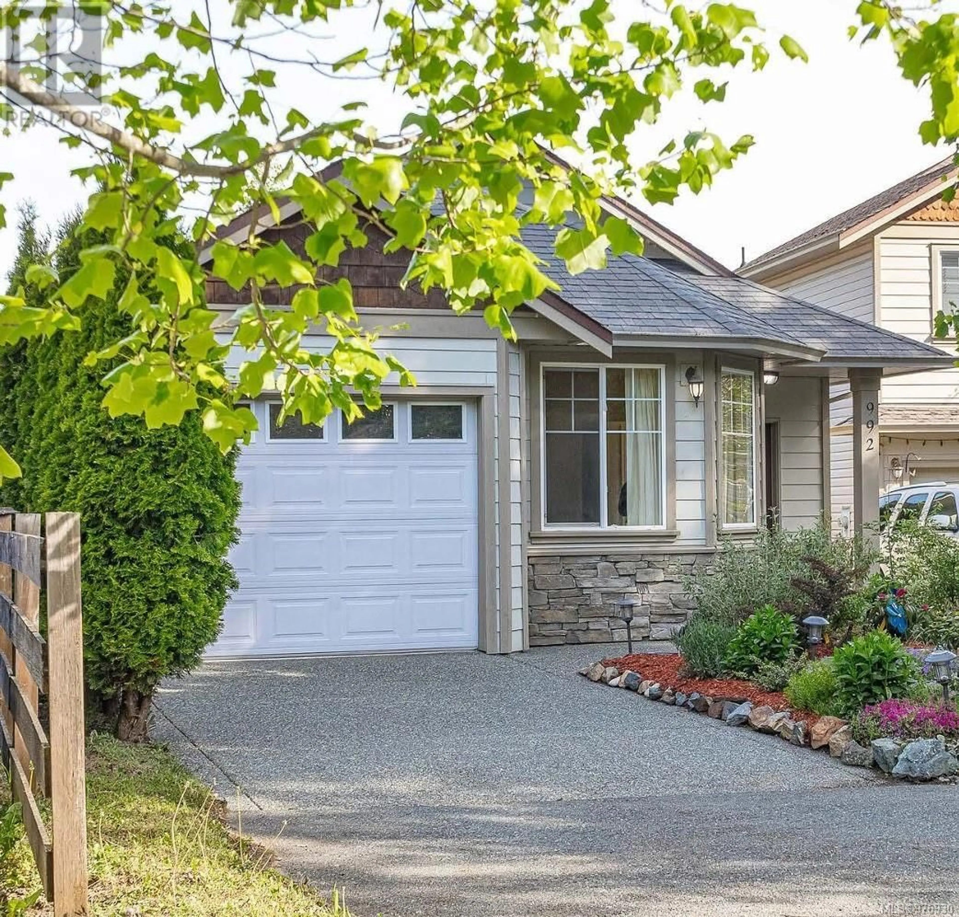 Frontside or backside of a home, the street view for 992 Wild Pond Lane, Langford British Columbia V9C4M7