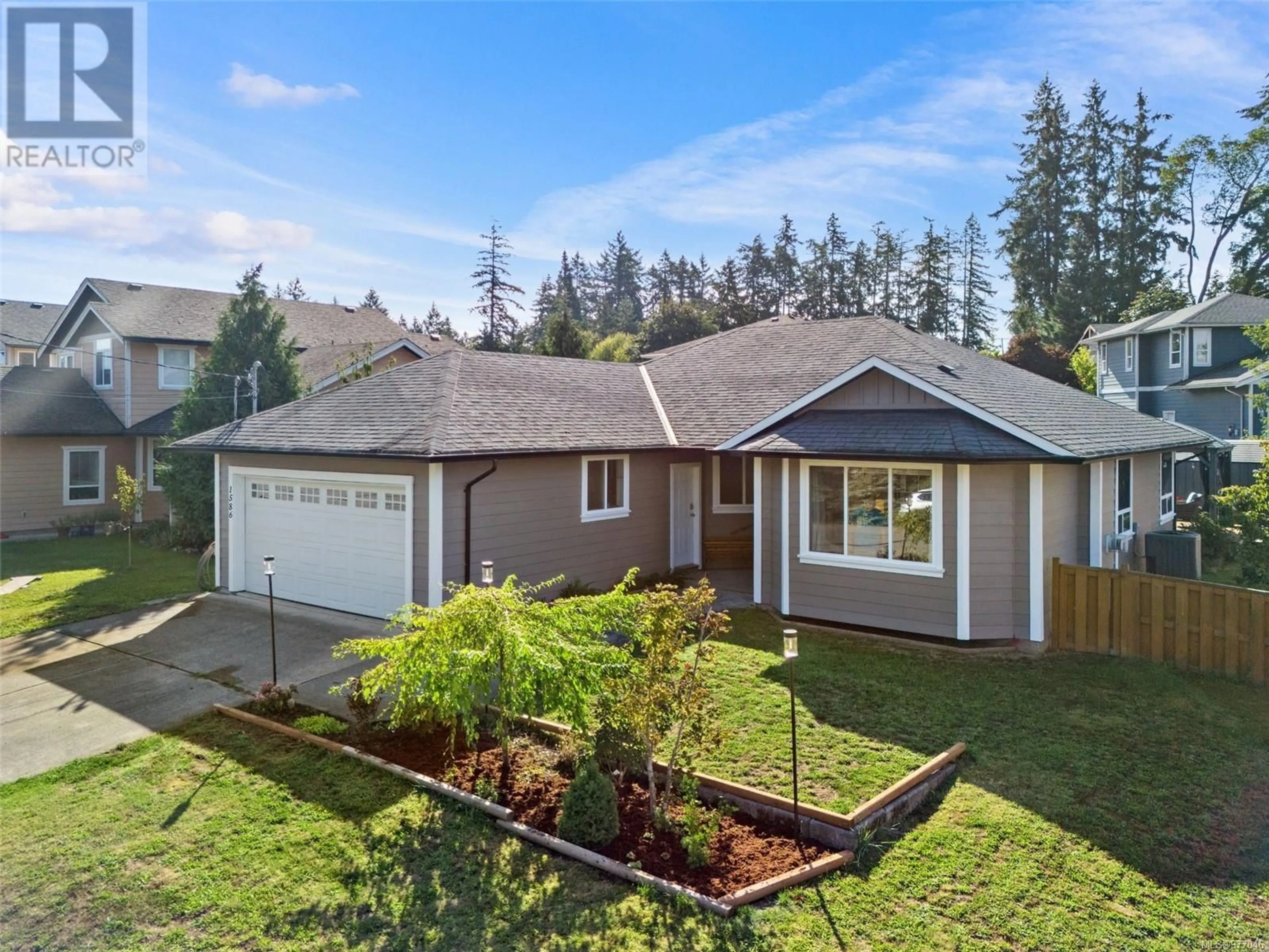 Frontside or backside of a home, the fenced backyard for 1586 Longwood Rd, Cowichan Bay British Columbia V0R1N0