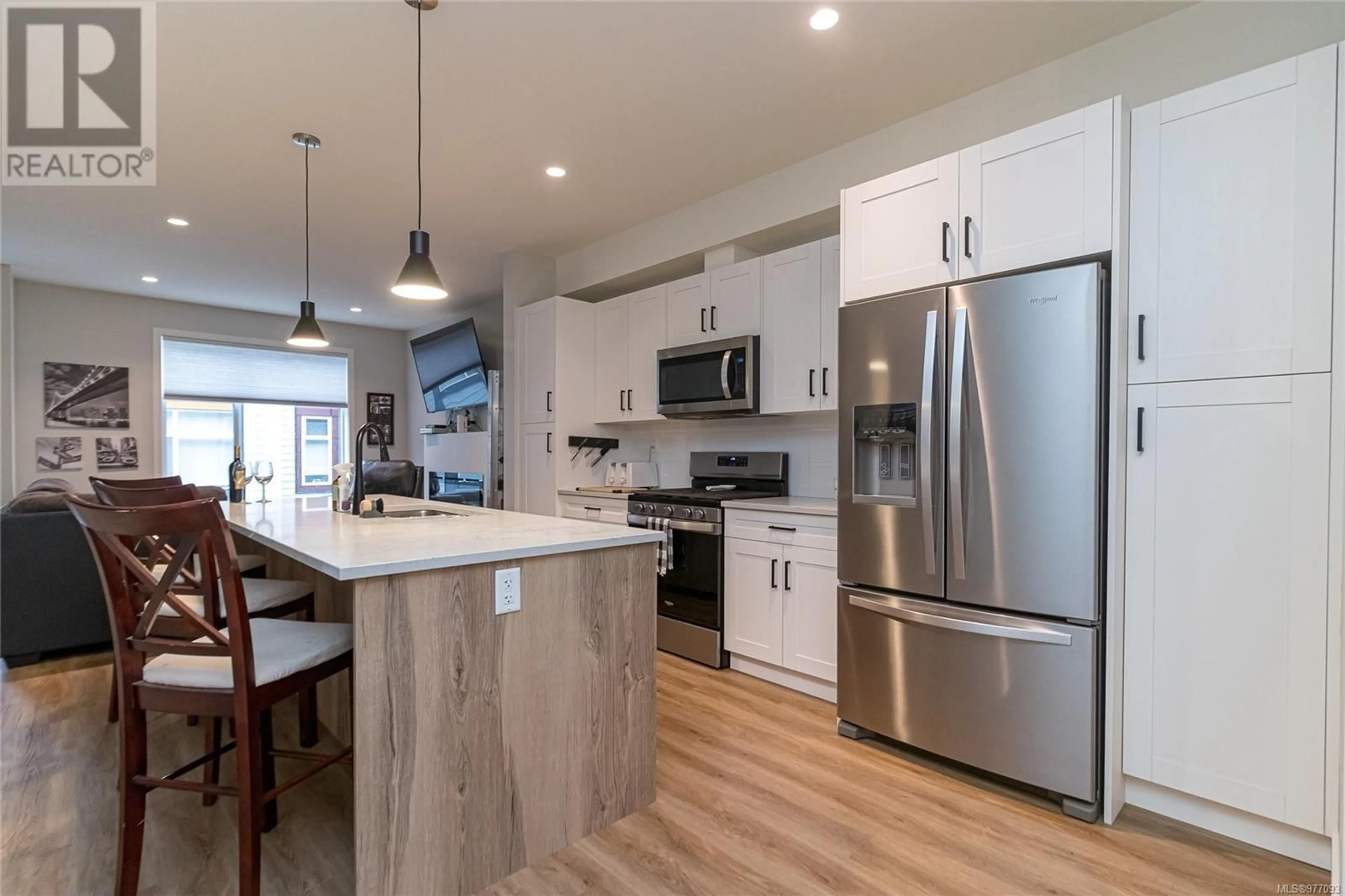 Open concept kitchen for 111 2130 Triangle Trail, Langford British Columbia V9C0R2