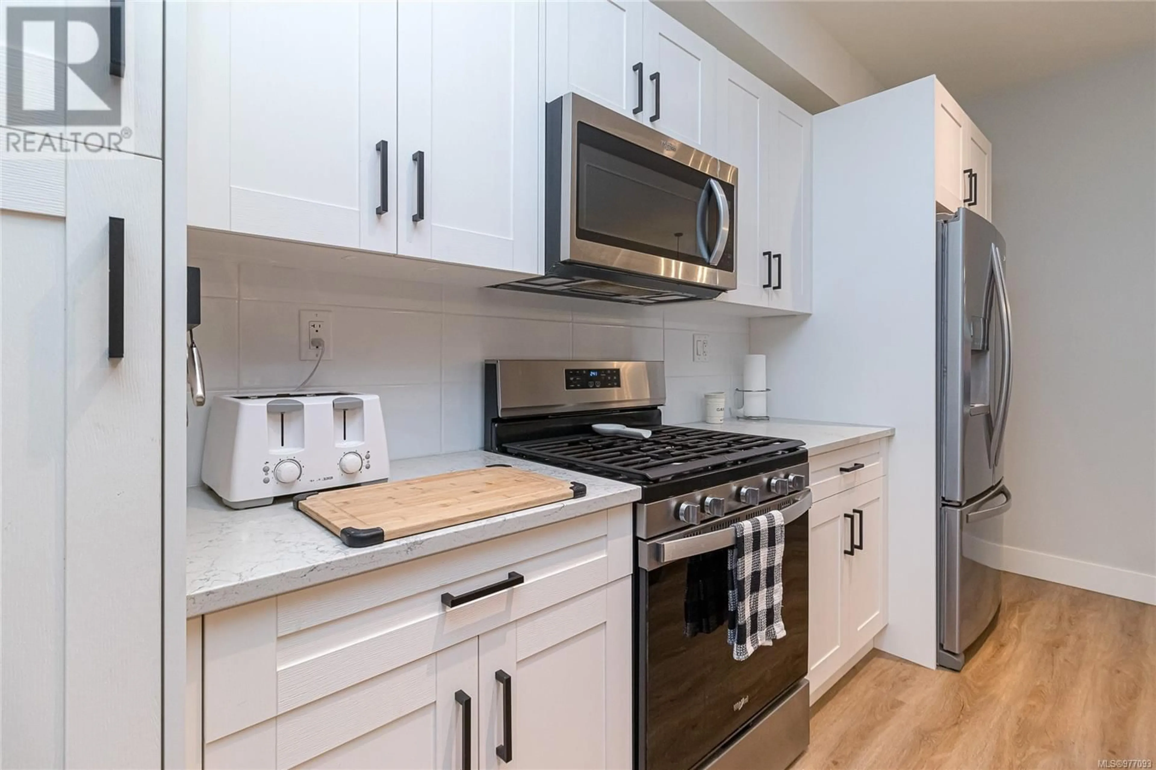 Standard kitchen, wood floors for 111 2130 Triangle Trail, Langford British Columbia V9C0R2