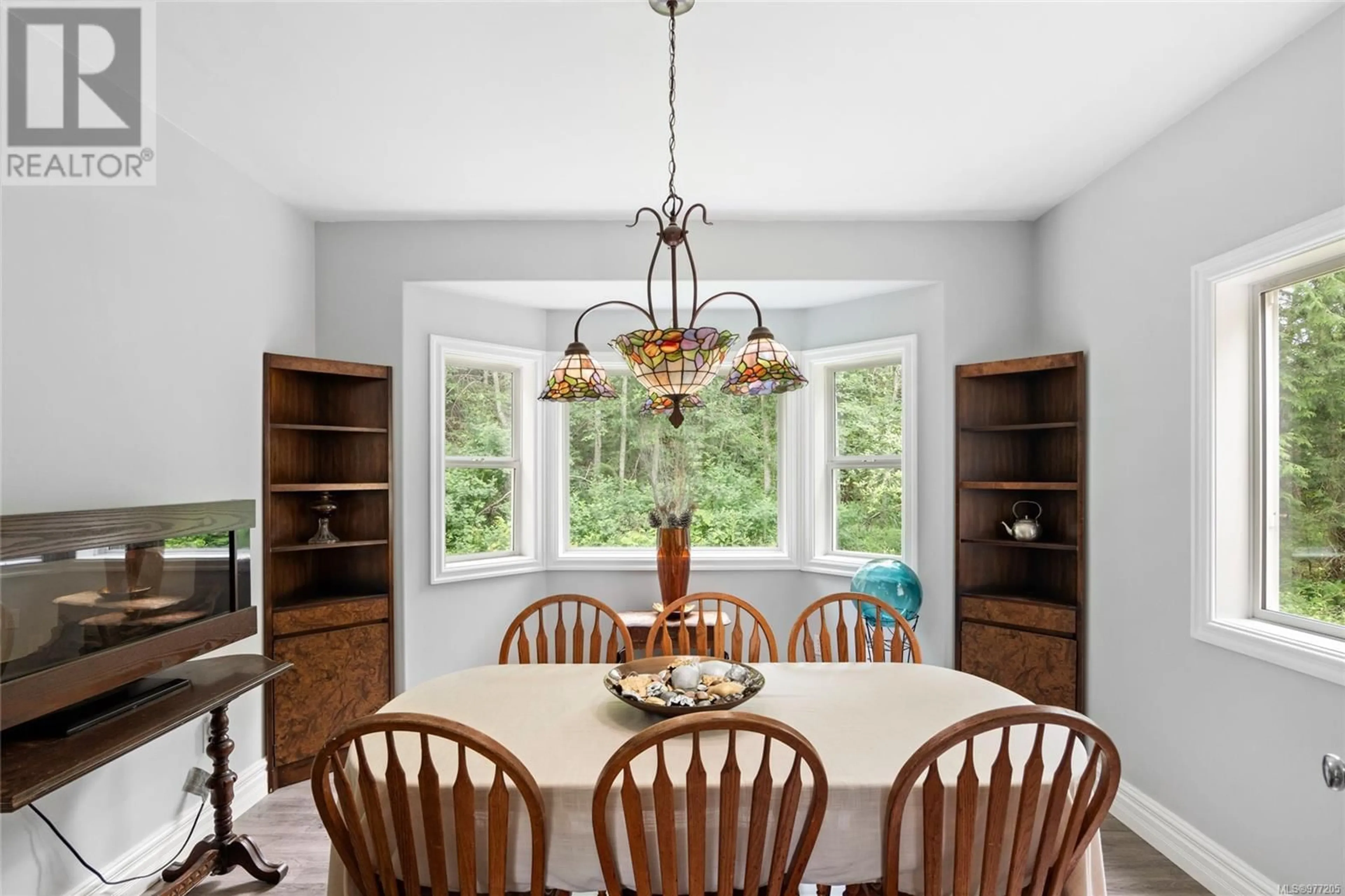 Dining room, wood floors, cottage for 7826 Atlin Pl, Crofton British Columbia V0R1R0