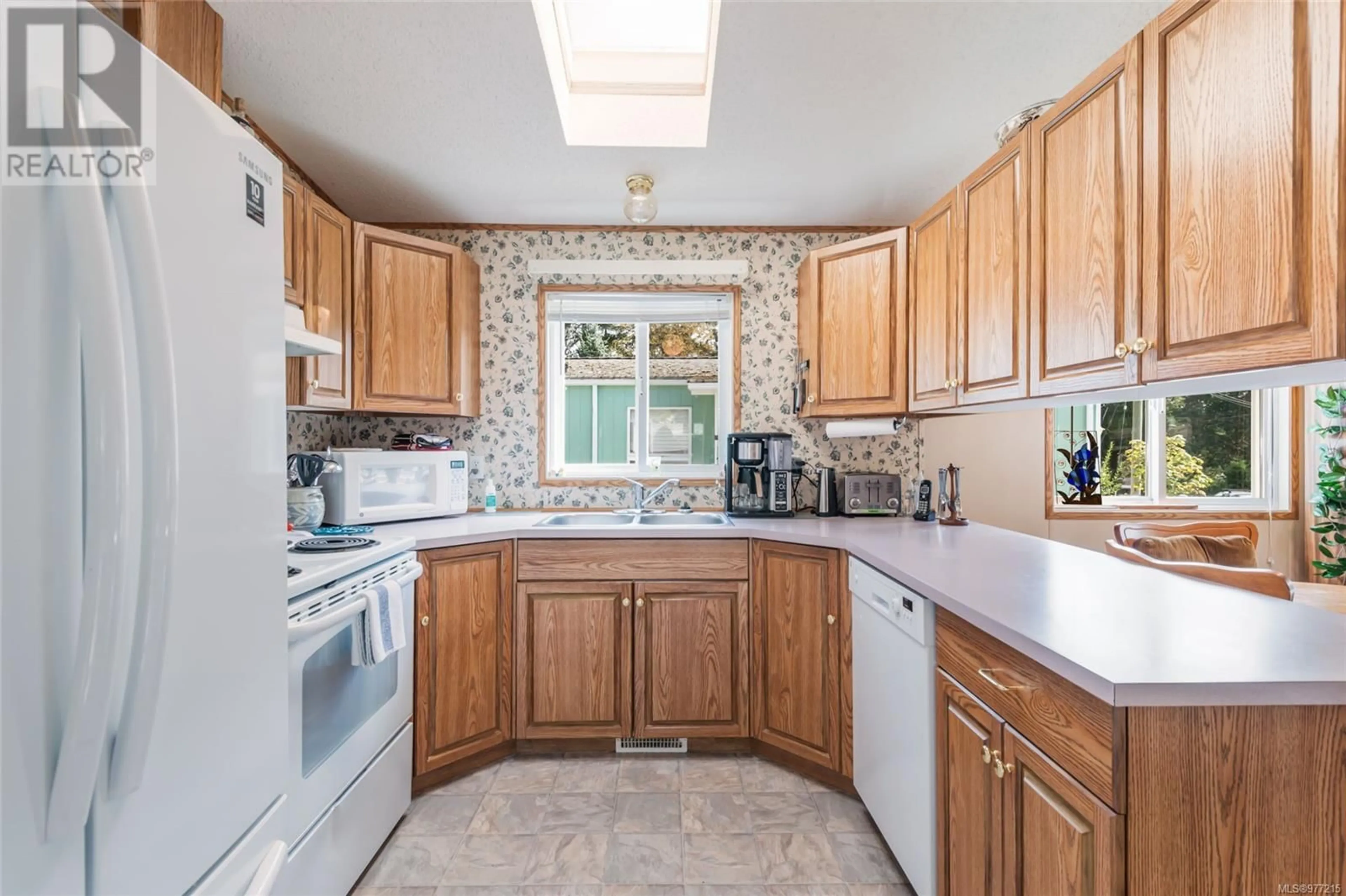 Kitchen, wood floors, cottage for 67 10325 Lakeshore Rd, Port Alberni British Columbia V9Y8G9