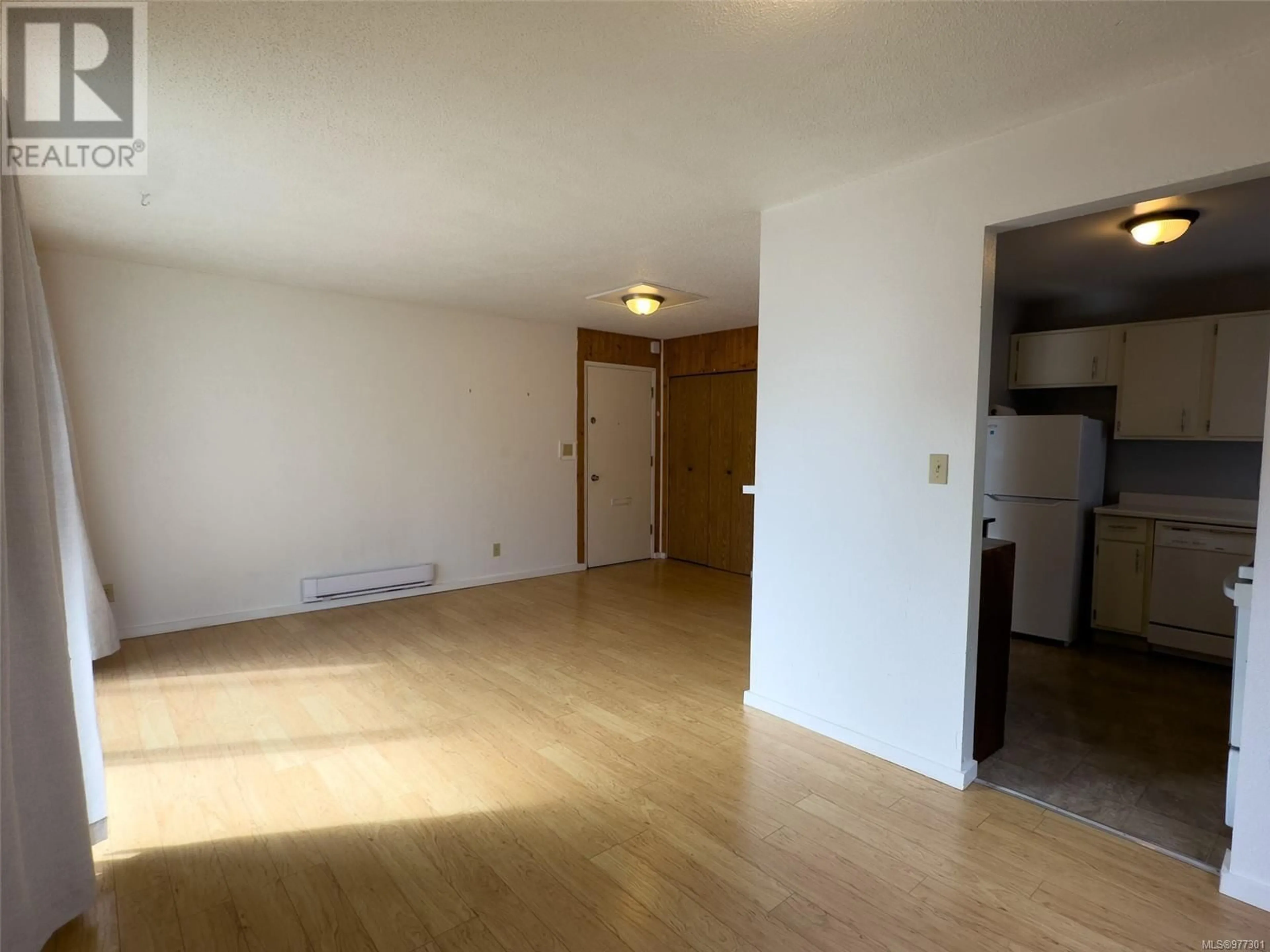 A pic of a room, wood floors for 12 7077 Highland Dr, Port Hardy British Columbia V0N2P0