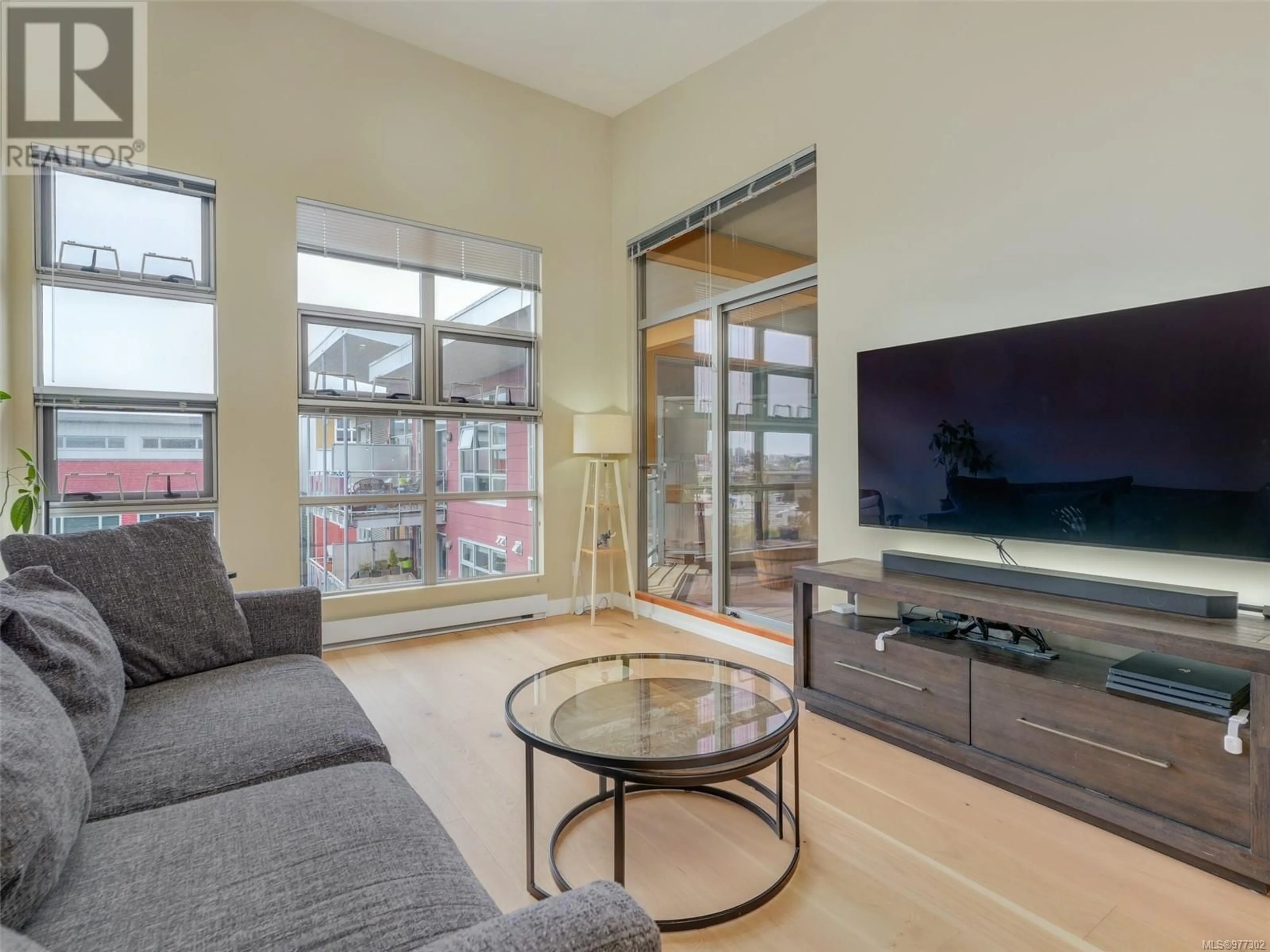 Living room, wood floors for 408 797 Tyee Rd, Victoria British Columbia V9A7R4