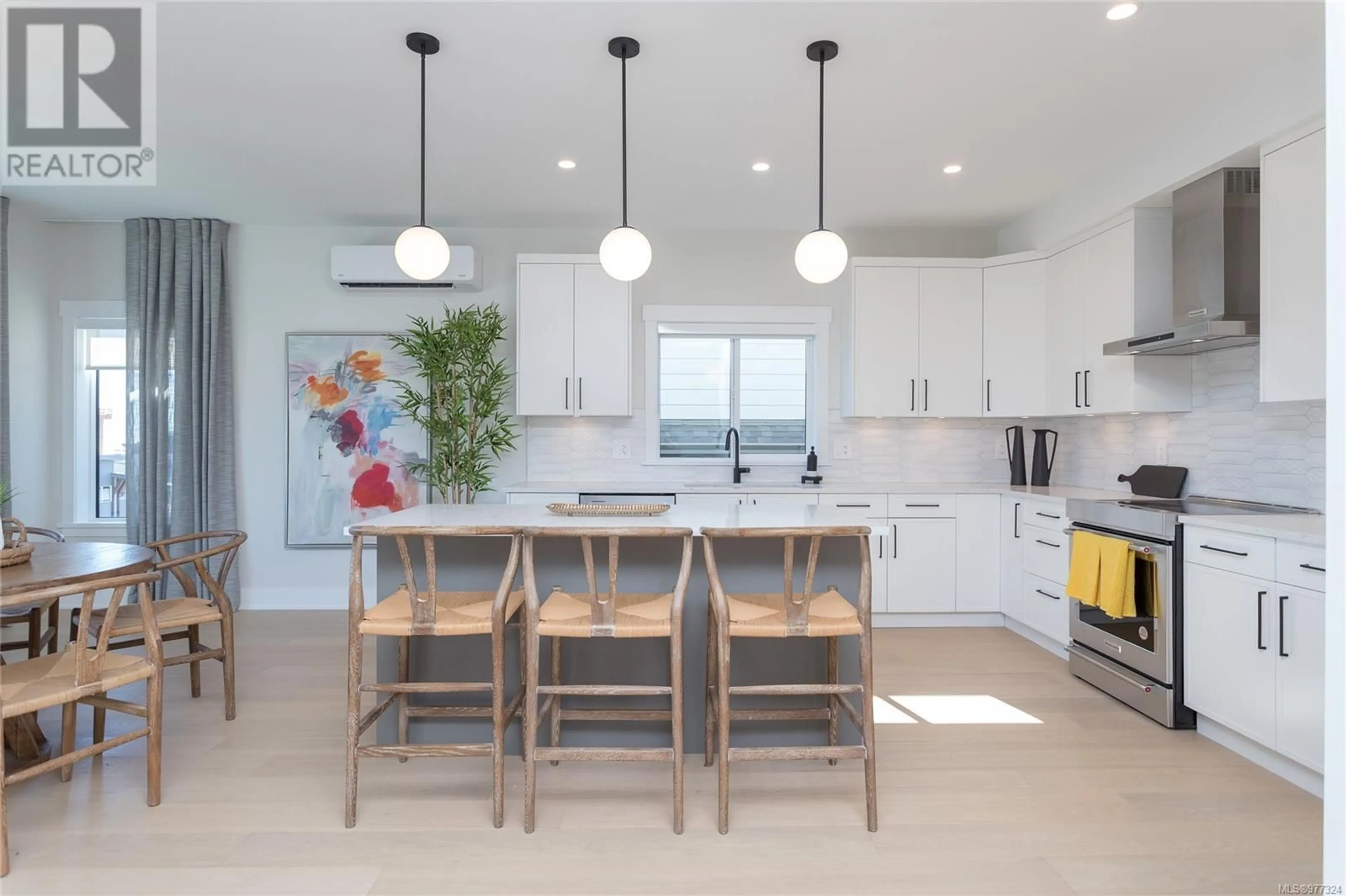 Contemporary kitchen, wood floors for 2648 Mica Pl, Langford British Columbia V9B5N1