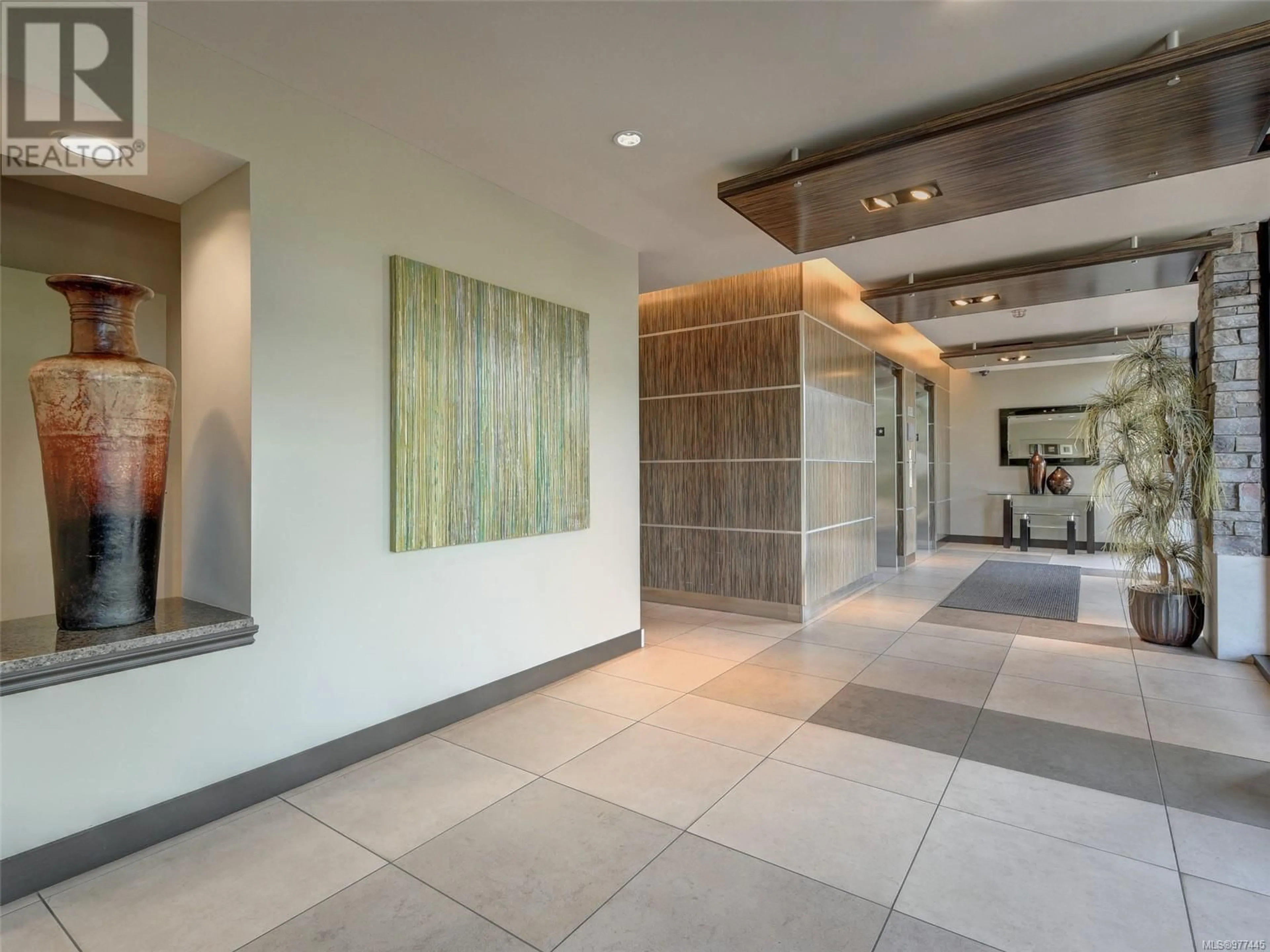 Indoor foyer, cement floor for 204 623 Treanor Ave, Langford British Columbia V9B0B1