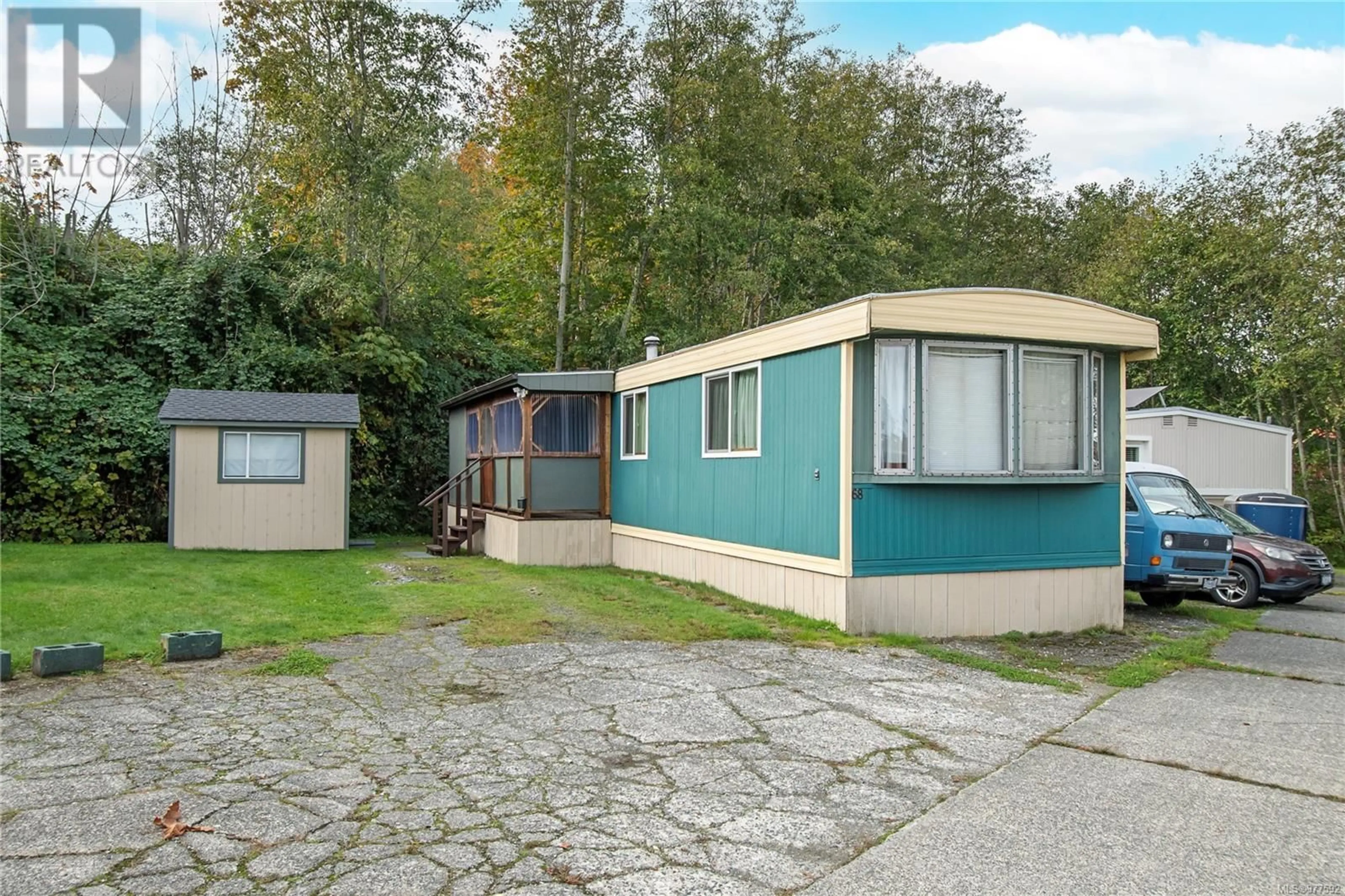 Home with vinyl exterior material for 68 951 Homewood Rd, Campbell River British Columbia V9W3N7