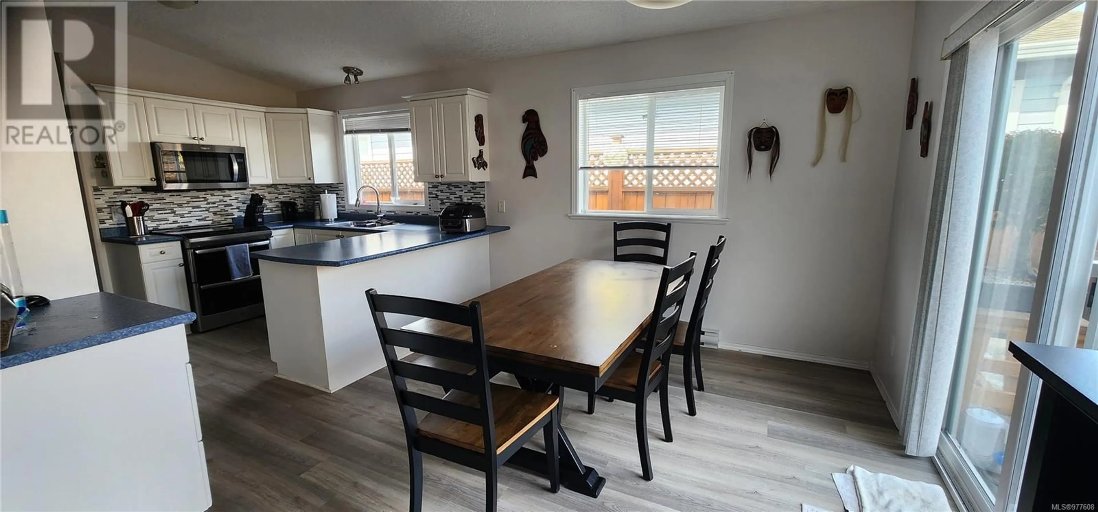 Dining room, wood floors, cottage for 66 7570 Tetayut Rd, Central Saanich British Columbia V8M2H4