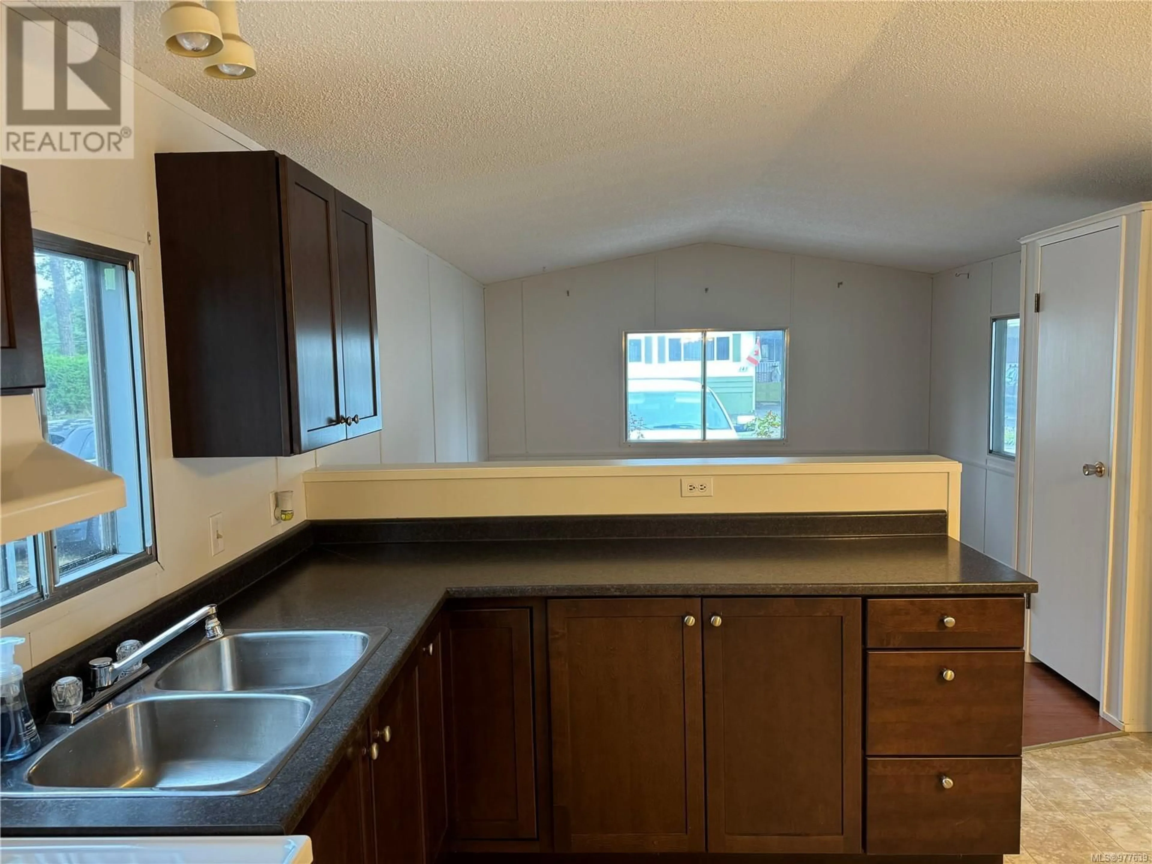 Standard kitchen, not visible floor, cottage for 106 1736 Timberlands Rd, Nanaimo British Columbia V9G1K3