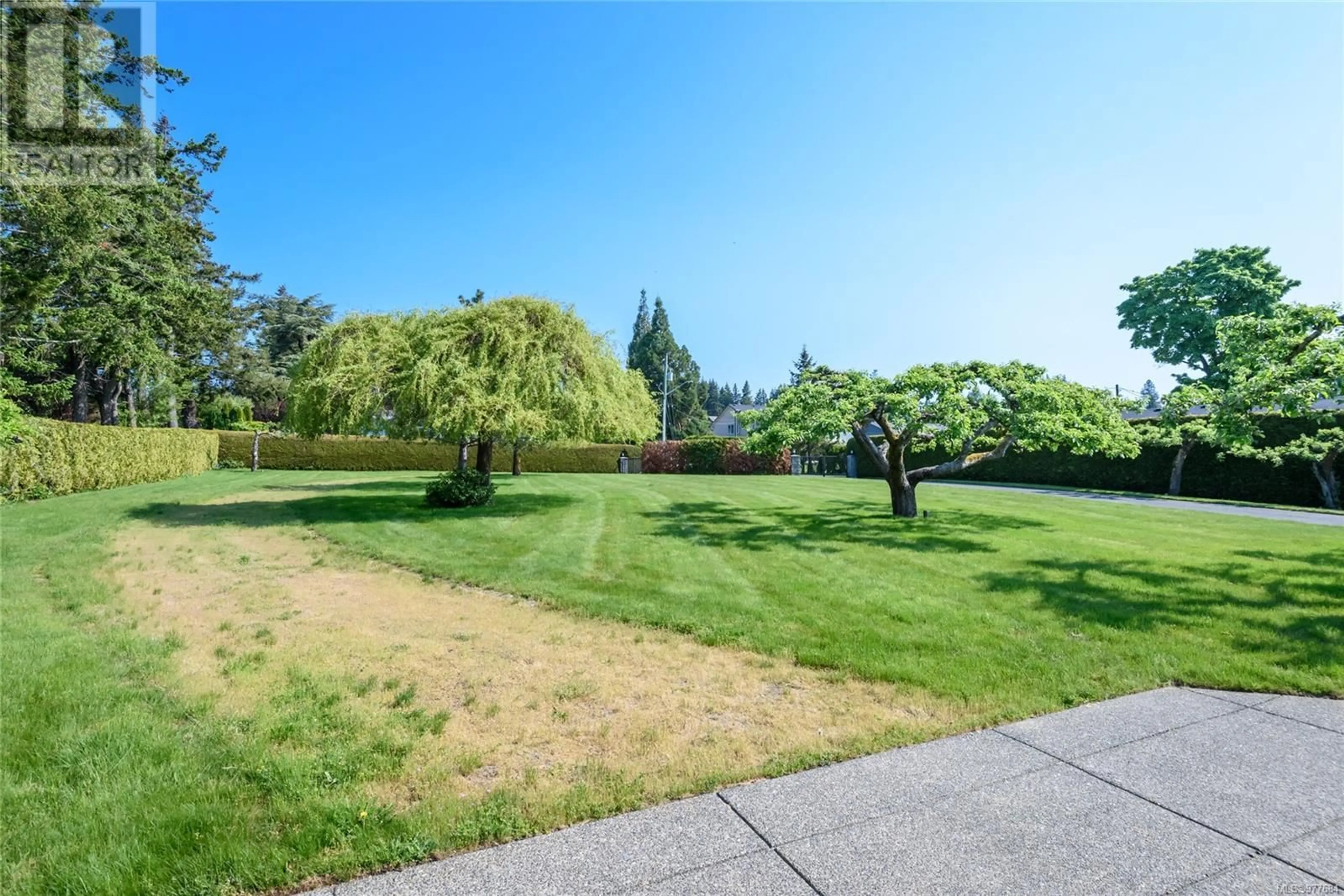 Patio, the fenced backyard for 155 Willow Way, Comox British Columbia V9M1T1