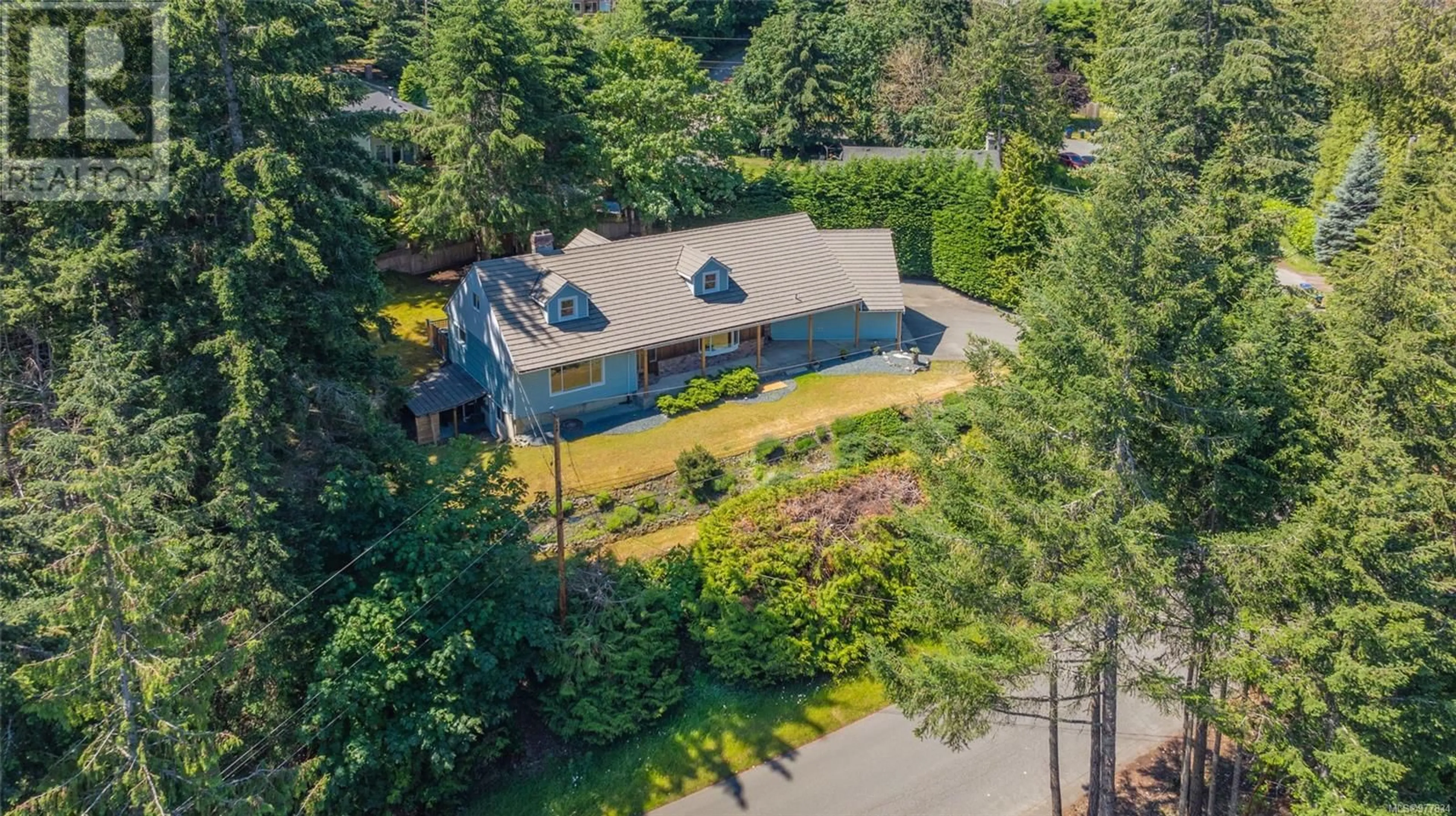 Frontside or backside of a home, the fenced backyard for 1968 Harlequin Cres, Nanoose Bay British Columbia V9P9J2