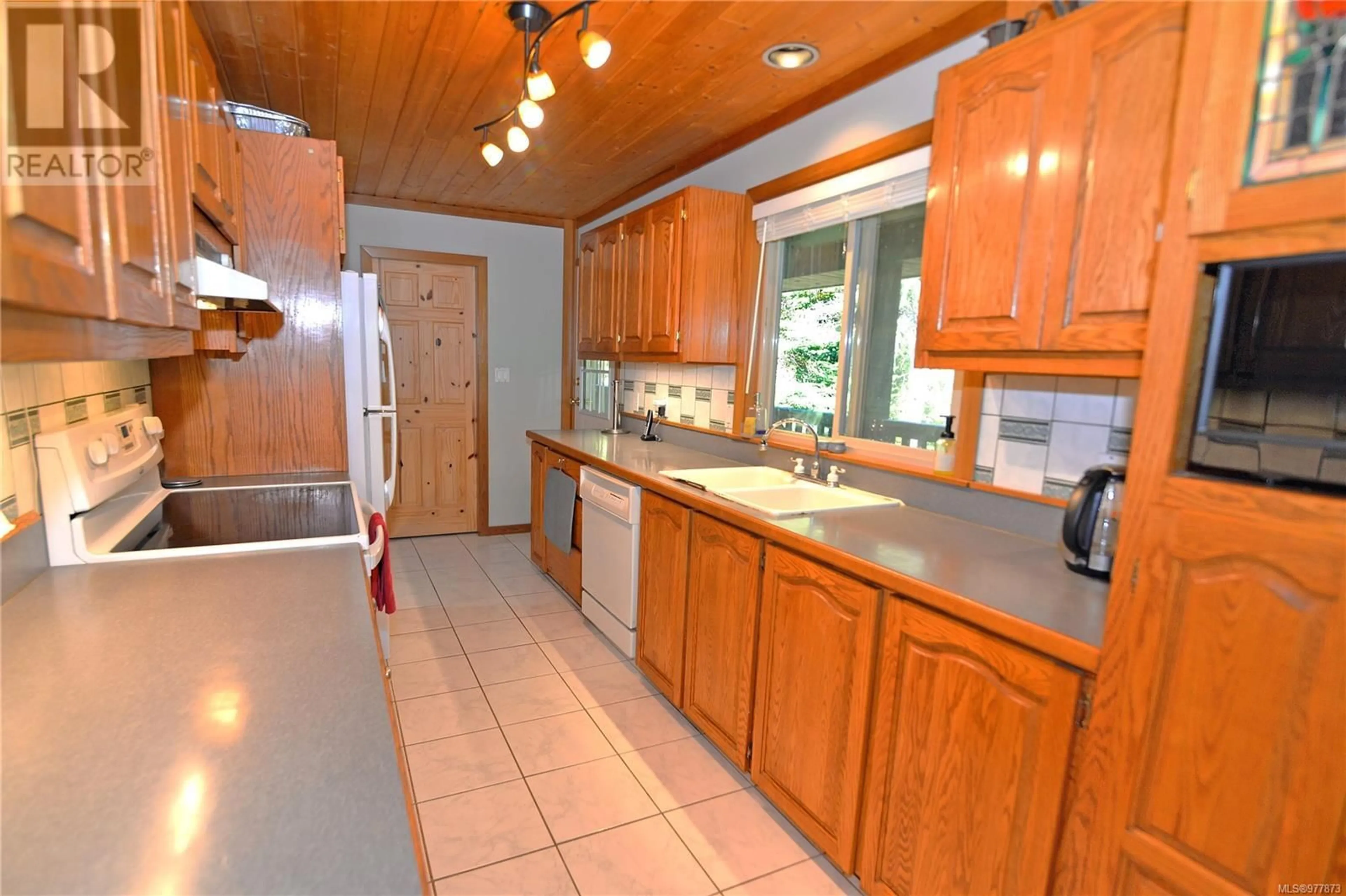 Kitchen, wood floors, cottage for 1637 Perry Rd, Gabriola Island British Columbia V0R1X7