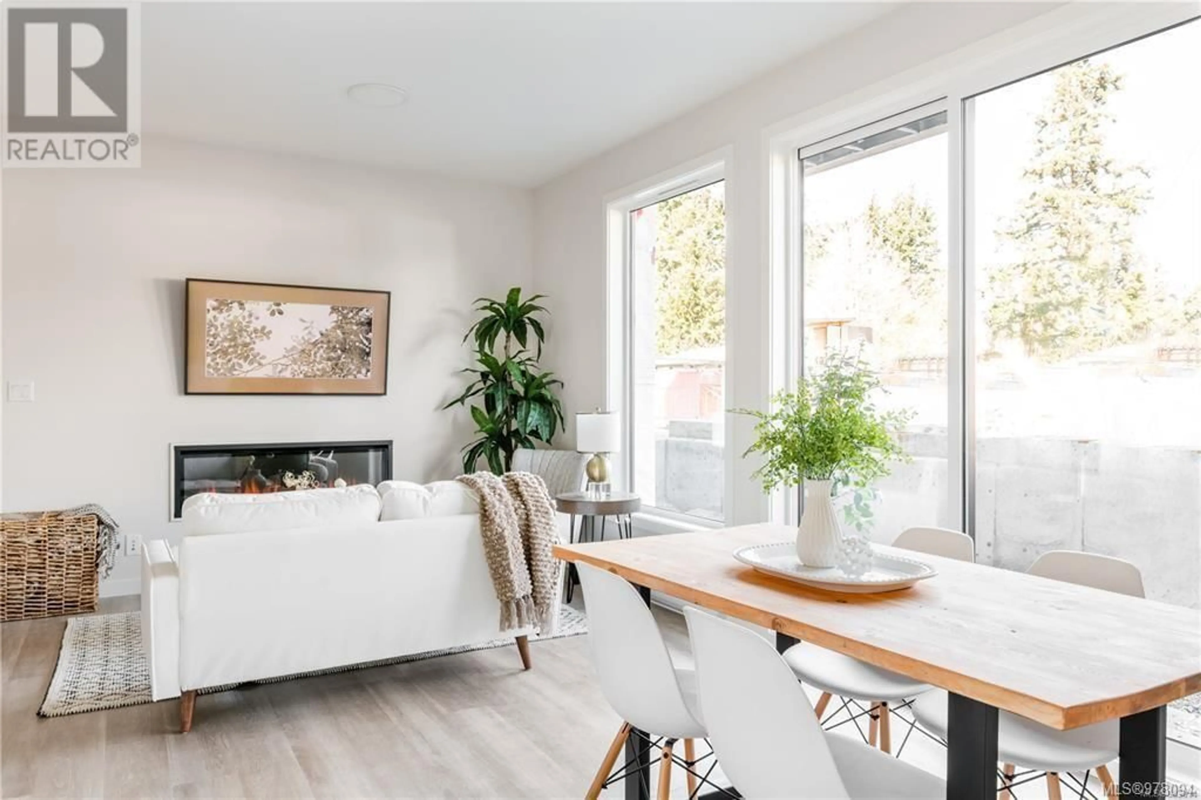 Living room, wood floors for 305 810 Orono Ave, Langford British Columbia V9B2T9