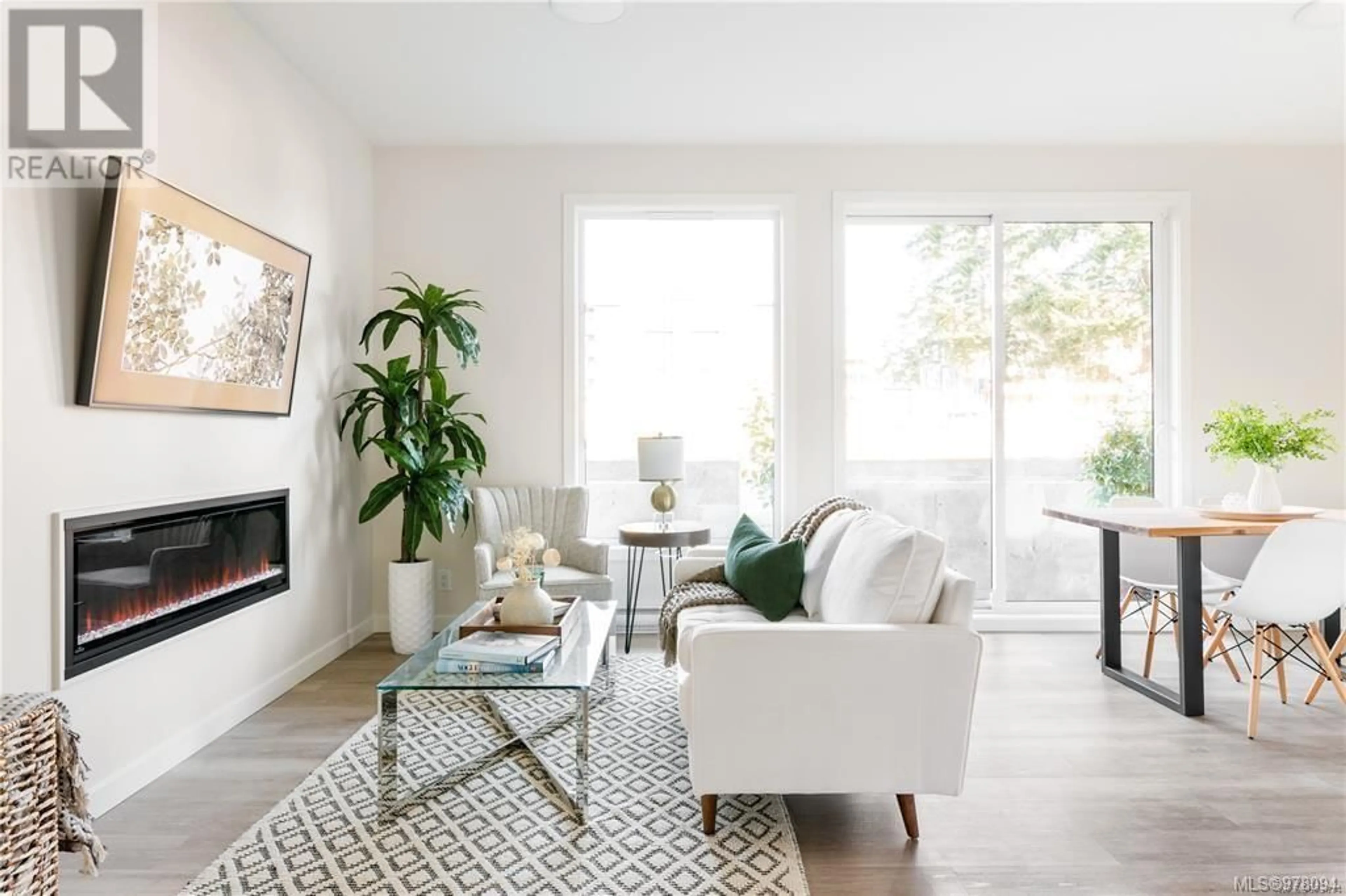 Living room, carpet floors for 305 810 Orono Ave, Langford British Columbia V9B2T9