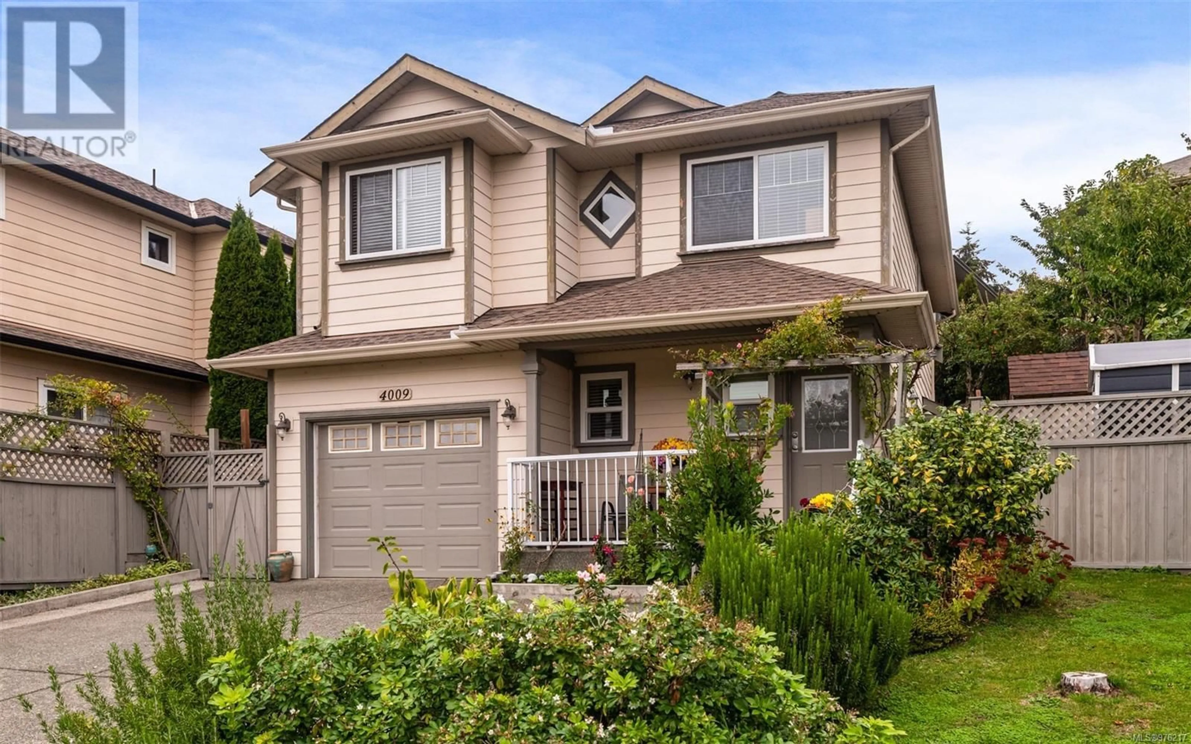 Frontside or backside of a home, cottage for 4009 Blackberry Lane, Saanich British Columbia V8X5J4