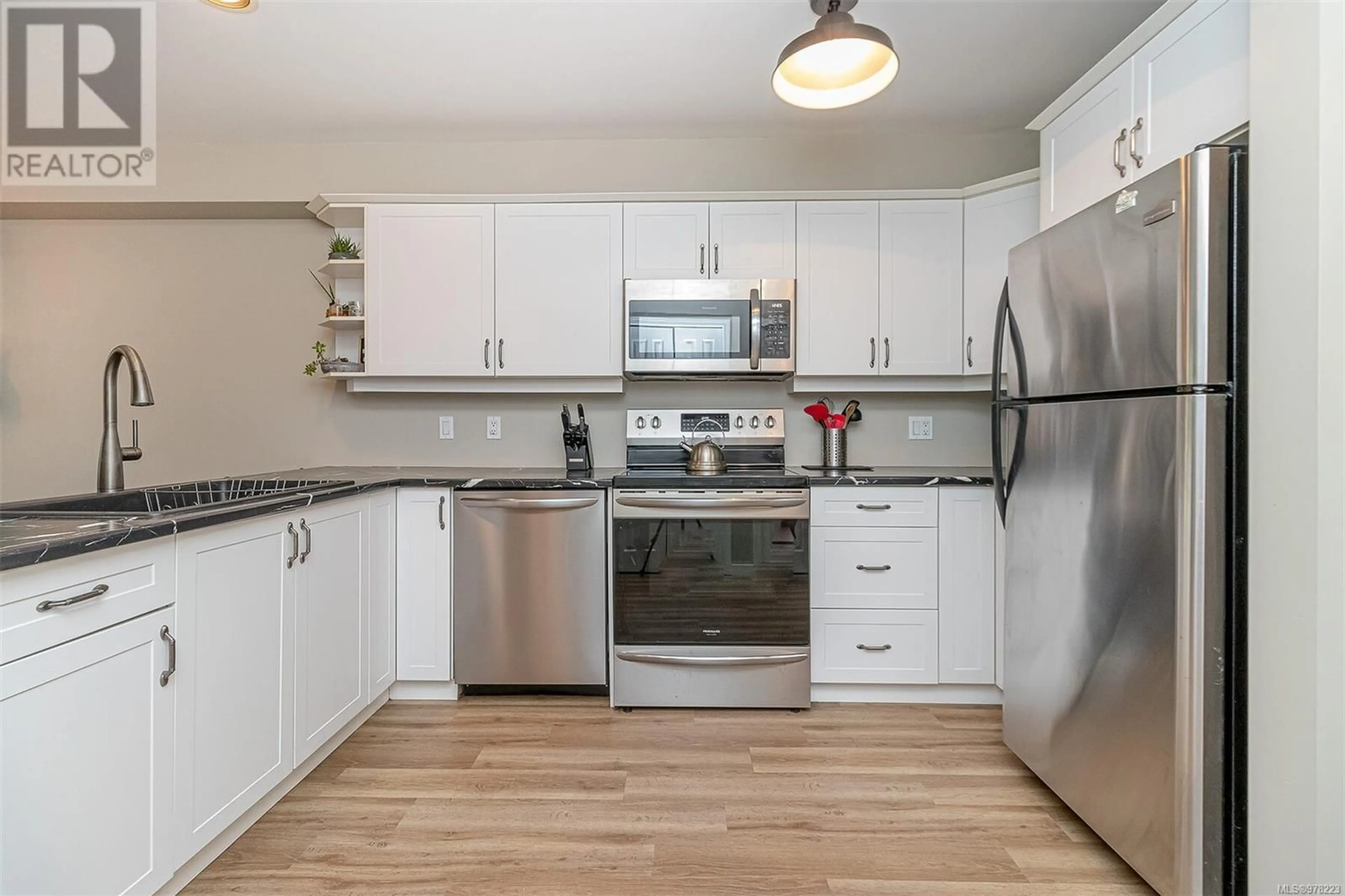 Standard kitchen, wood floors, cottage for 106 364 Goldstream Ave, Colwood British Columbia V9B2W3