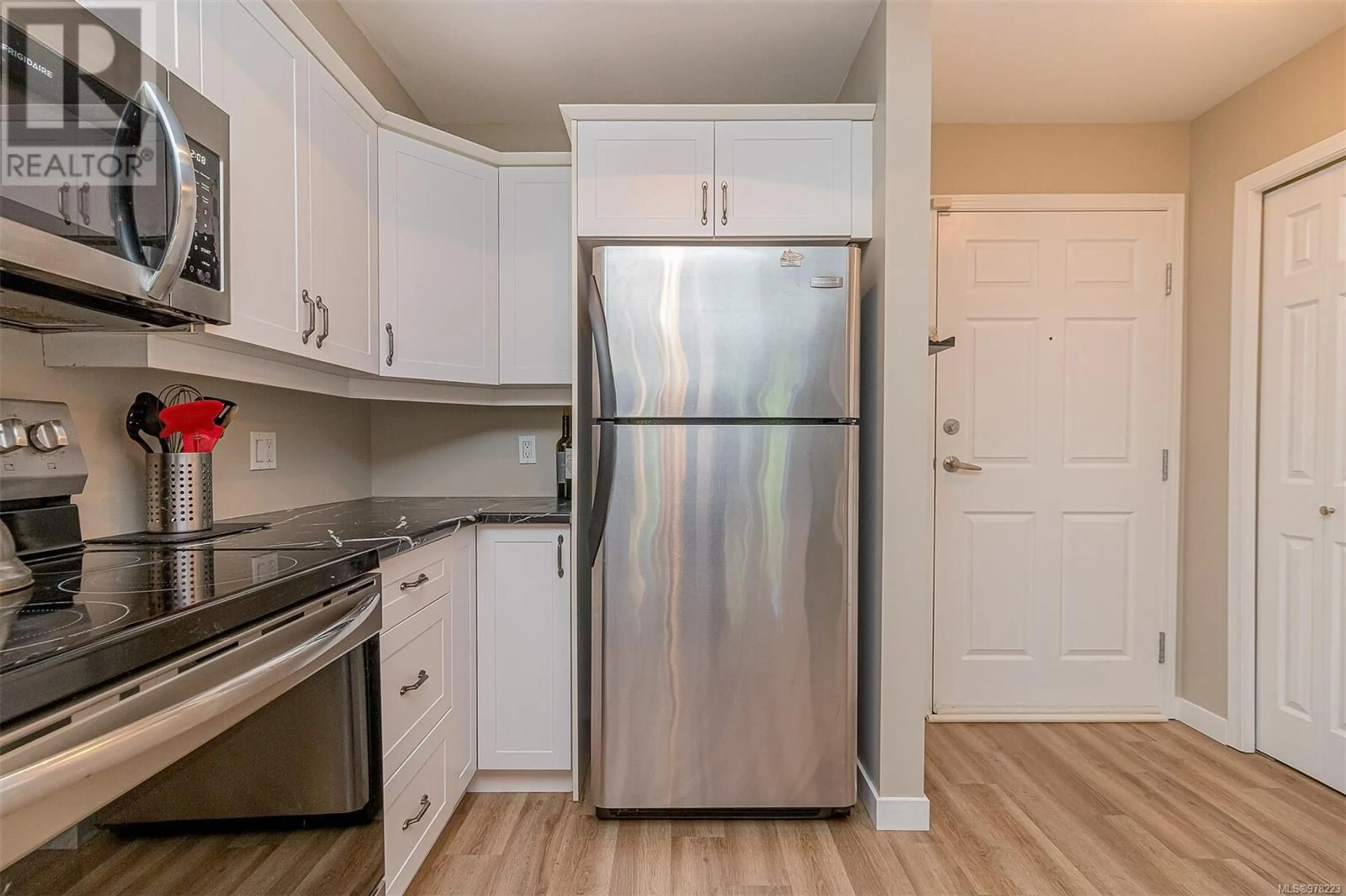 Standard kitchen, wood floors for 106 364 Goldstream Ave, Colwood British Columbia V9B2W3