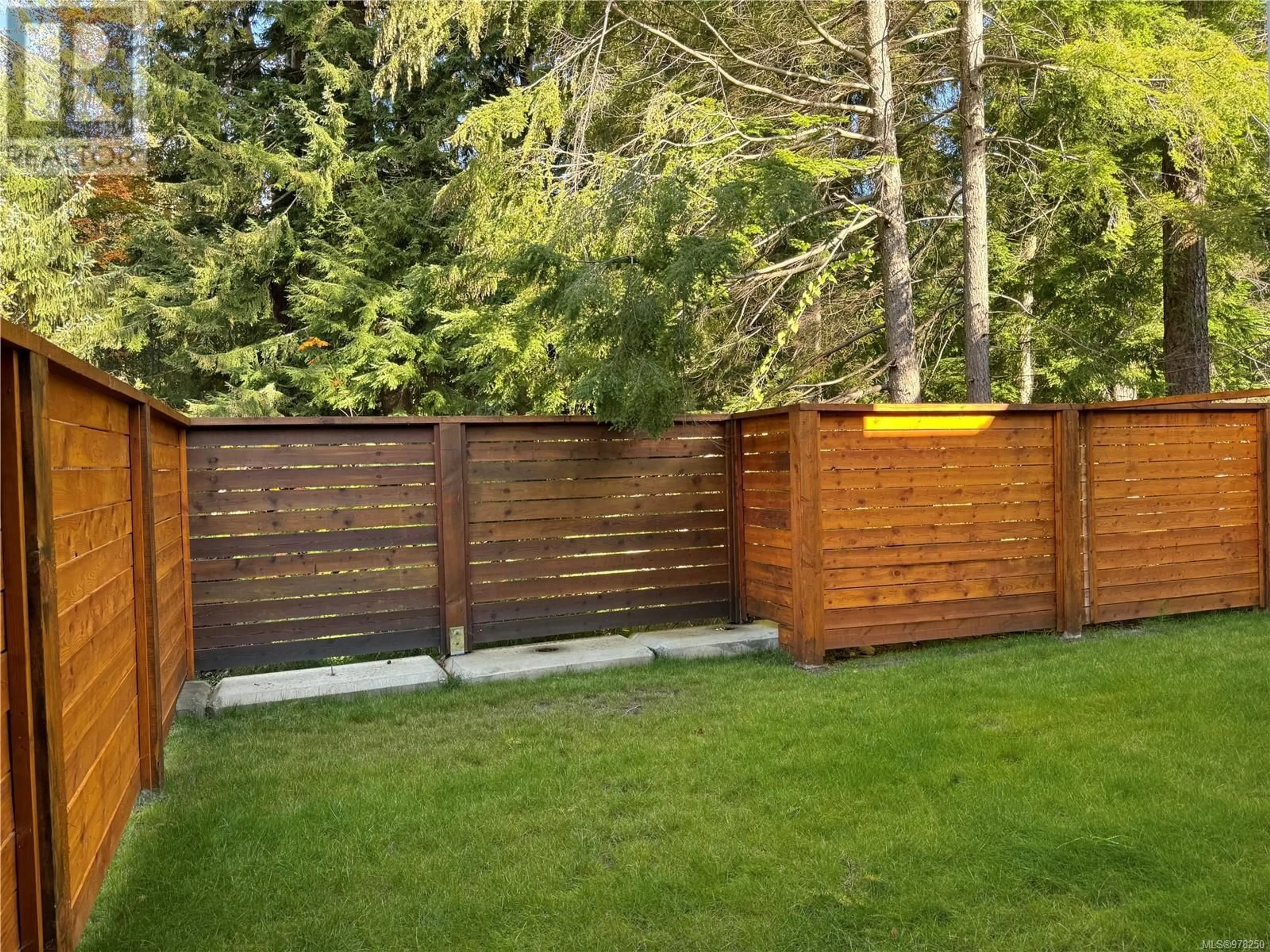 Patio, the fenced backyard for 20 1090 Evergreen Rd, Campbell River British Columbia V9W3R9