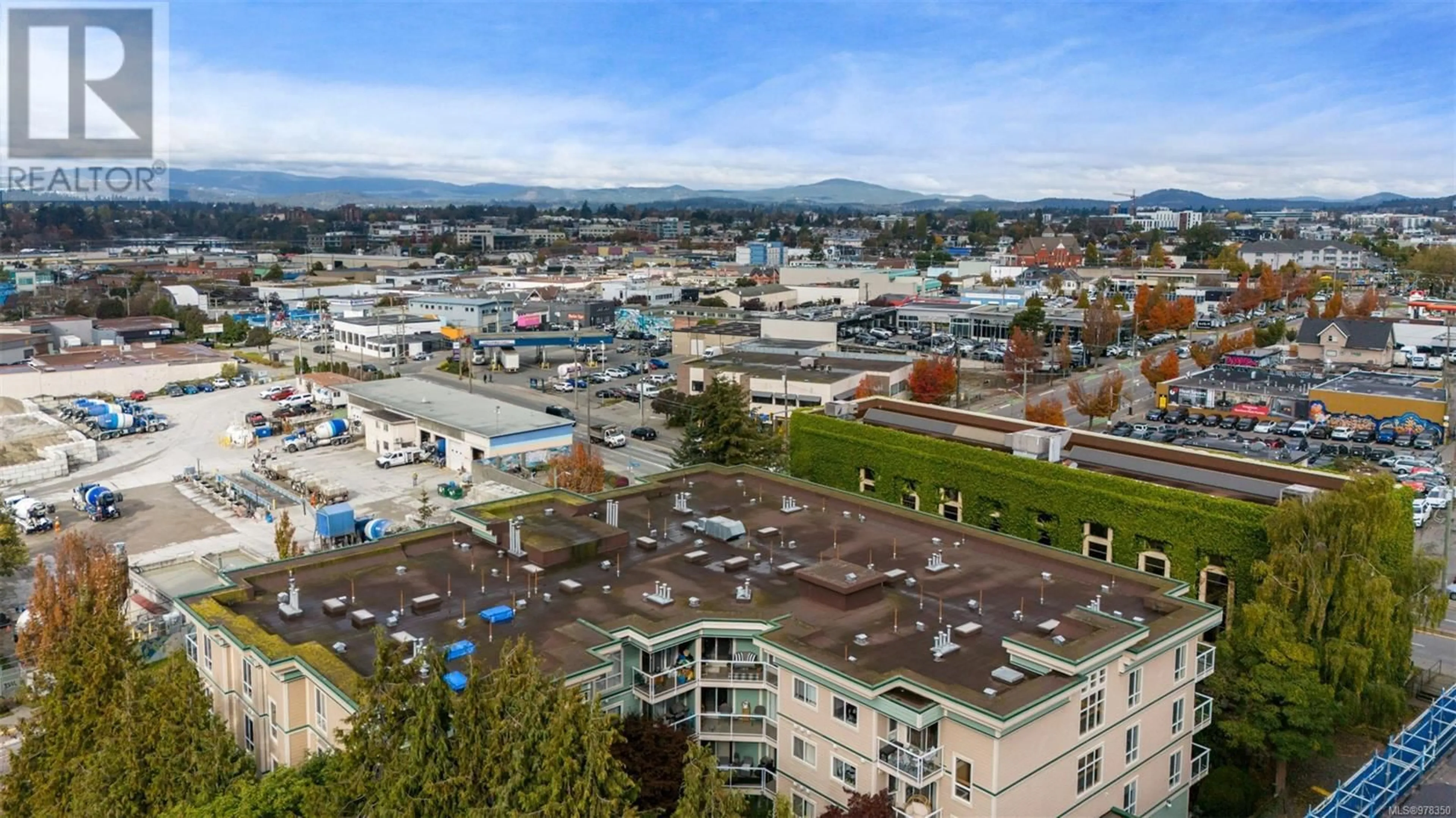 A pic from exterior of the house or condo, the view of city buildings for 403 649 Bay St, Victoria British Columbia V8T5B8