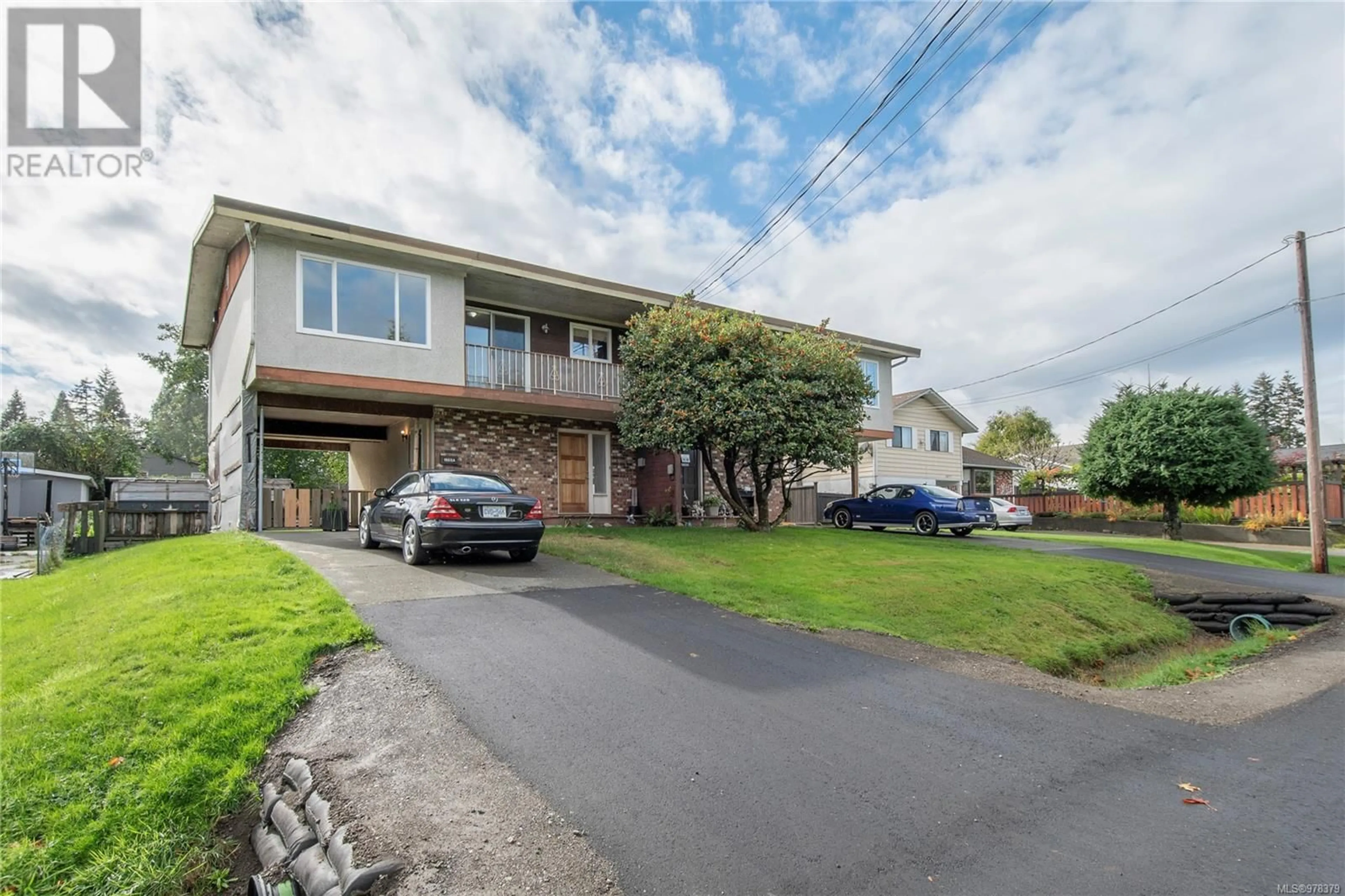 Frontside or backside of a home, the street view for 1869 Cheviot Rd, Campbell River British Columbia V9W4E2