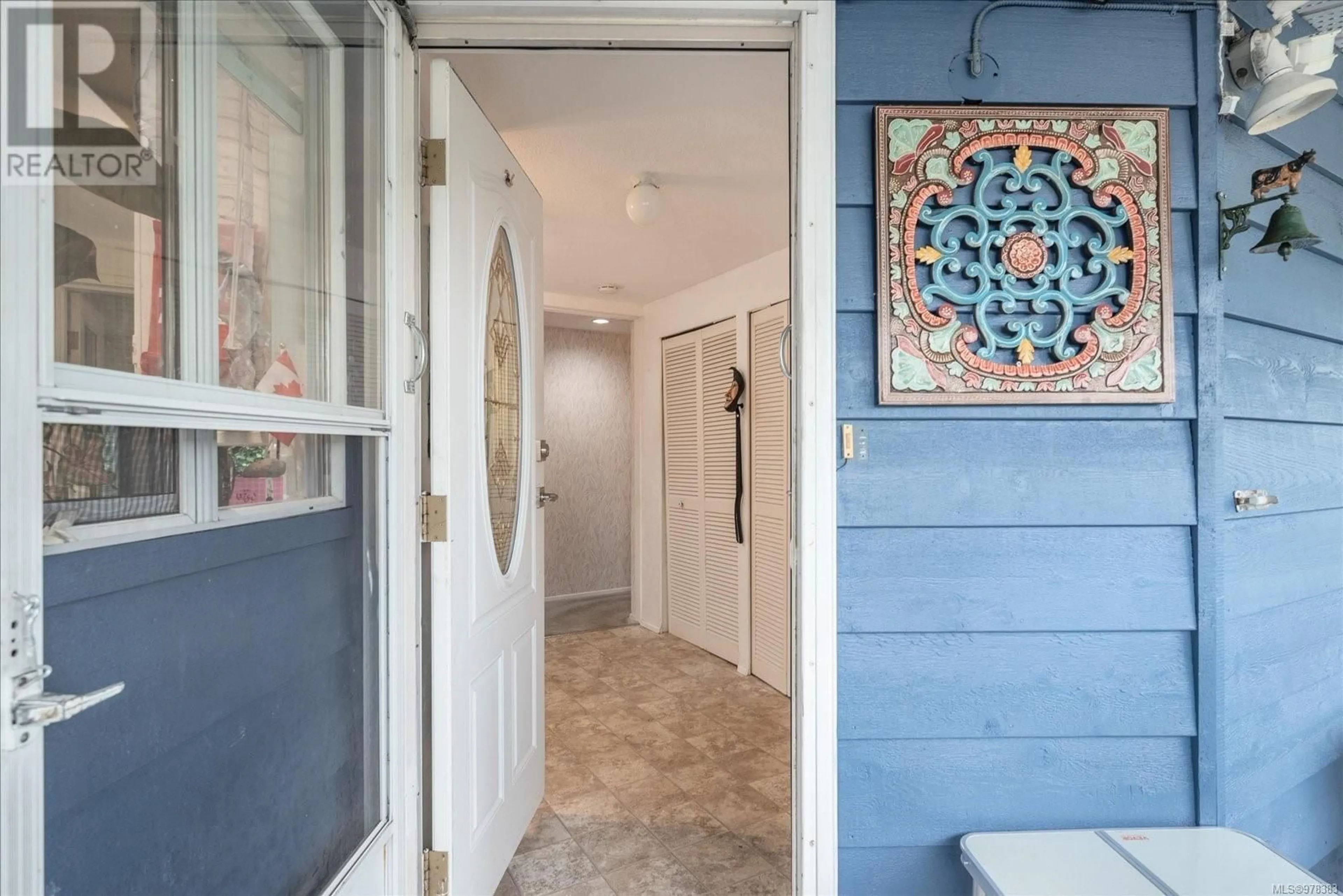 Indoor entryway, wood floors for 98 6325 Metral Dr, Nanaimo British Columbia V9T6P9