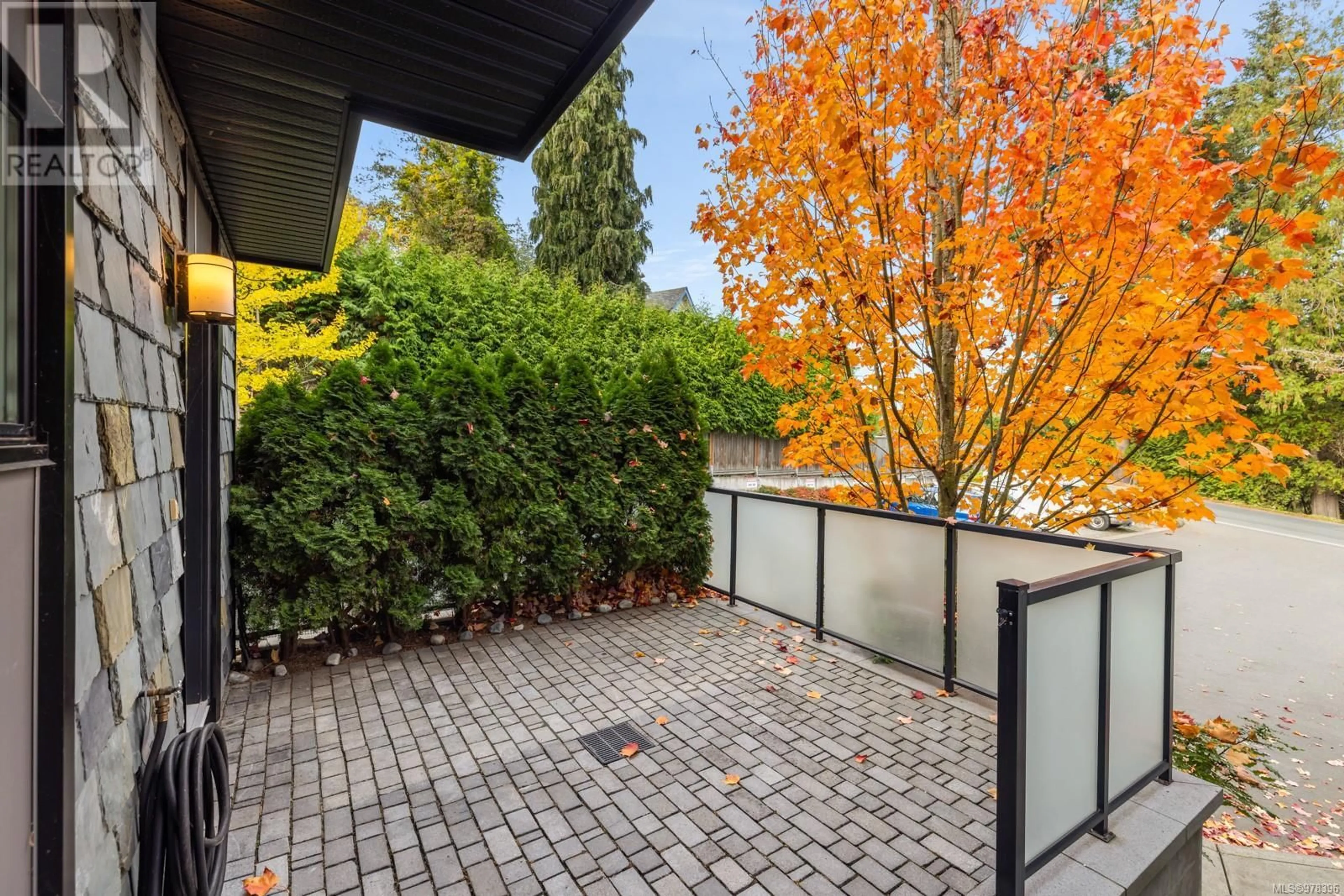 Patio, the fenced backyard for 1 2321 Island View Rd, Central Saanich British Columbia V8X0C9