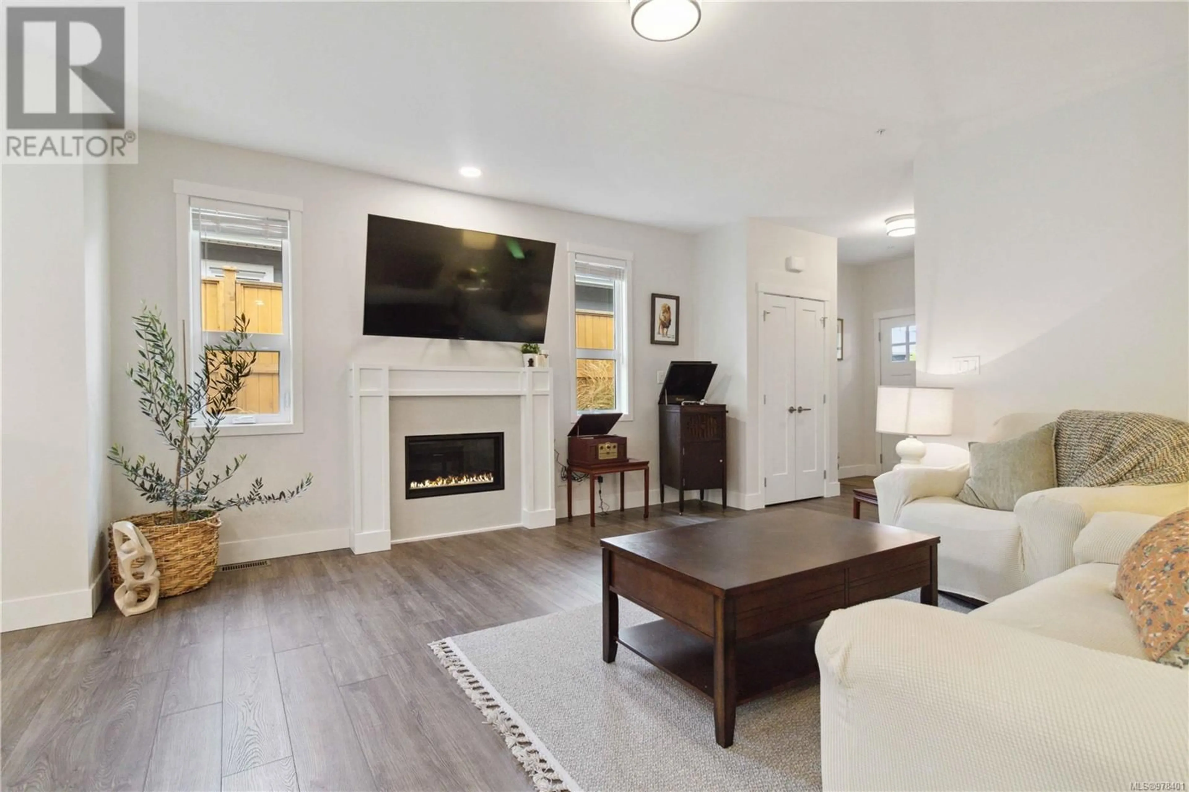 Living room, wood floors for 7 265 Caspian Dr, Colwood British Columbia V9C0P8