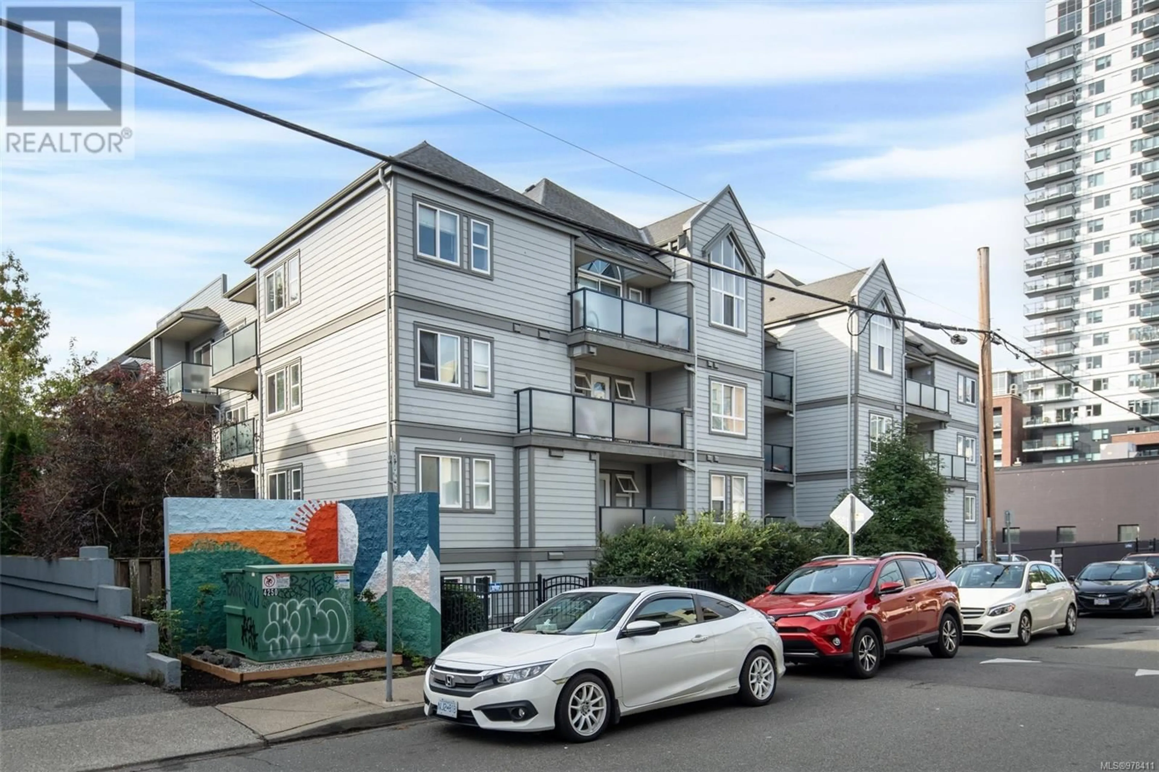 A pic from exterior of the house or condo, the street view for 103 827 North Park St, Victoria British Columbia V8W1S9