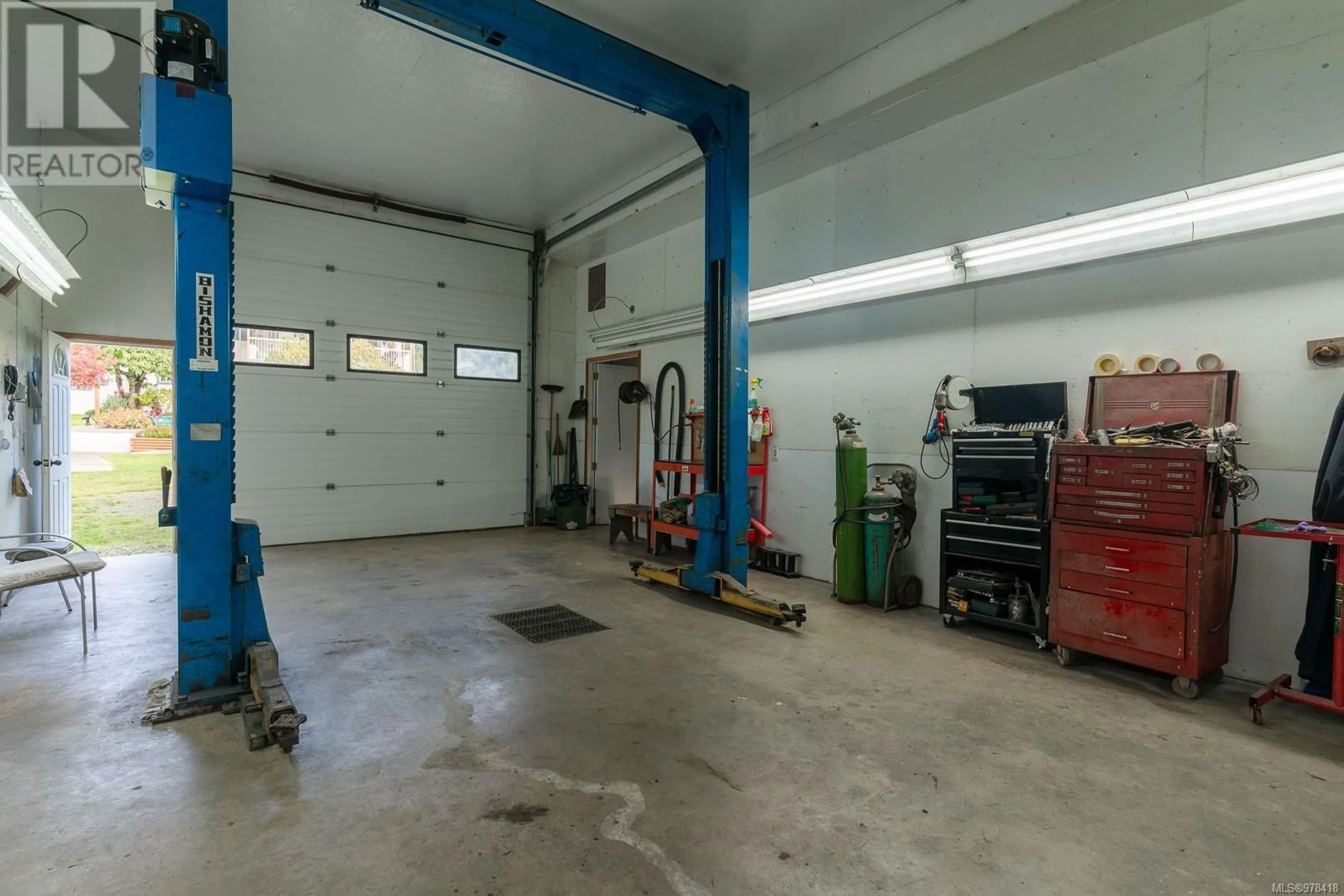 Indoor garage, cement floor for 5854 Strathcona St, Port Alberni British Columbia V9Y8S4