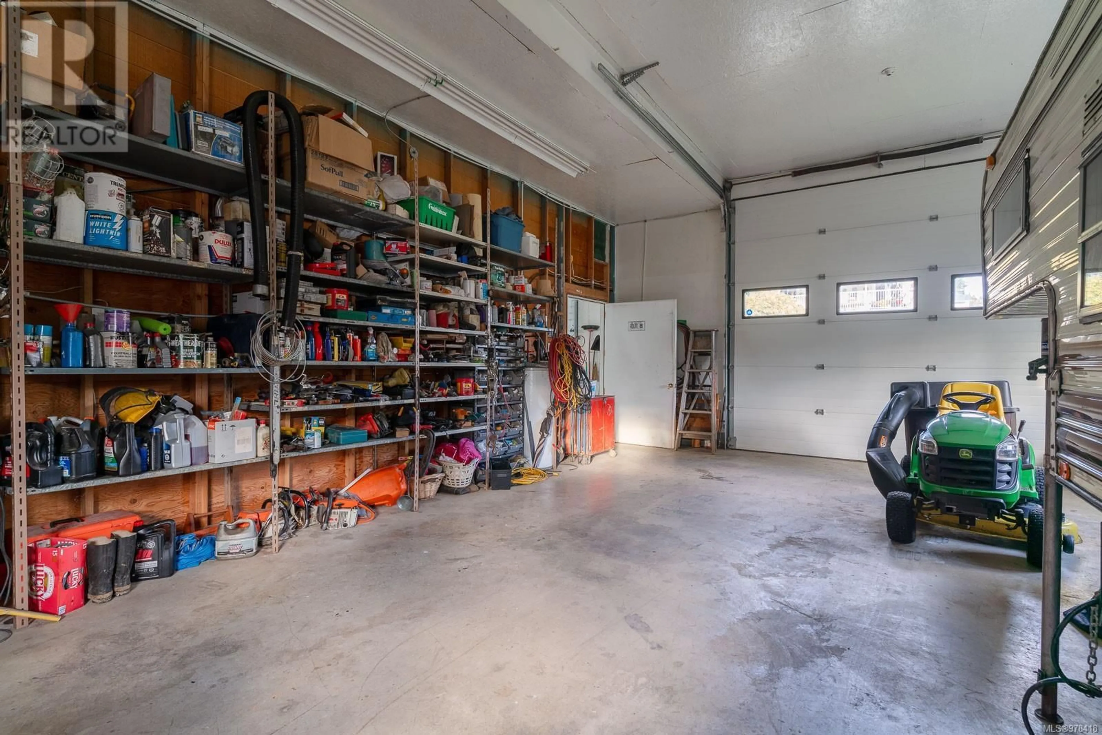 Indoor garage, cement floor for 5854 Strathcona St, Port Alberni British Columbia V9Y8S4