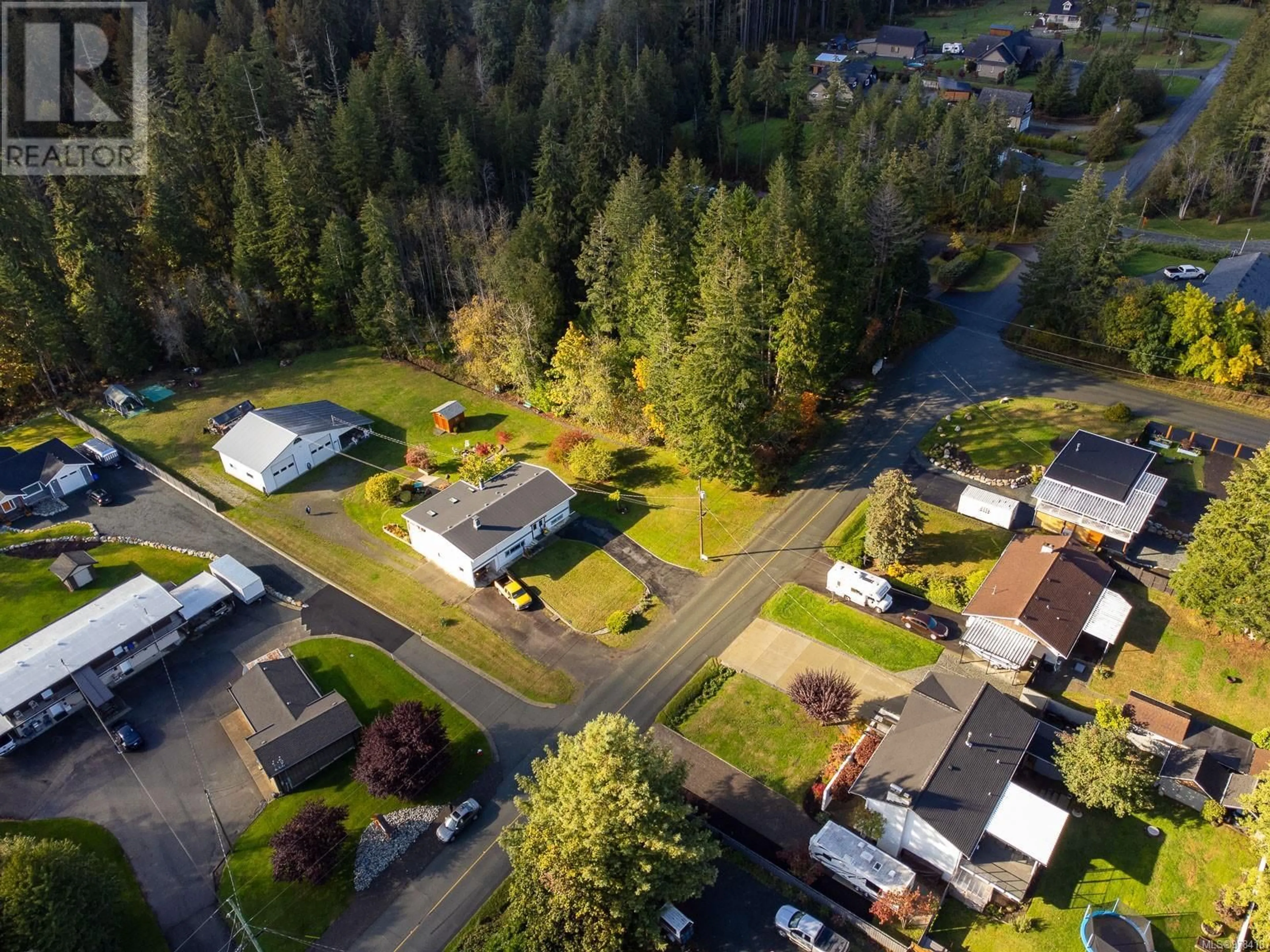 Frontside or backside of a home, the fenced backyard for 5854 Strathcona St, Port Alberni British Columbia V9Y8S4