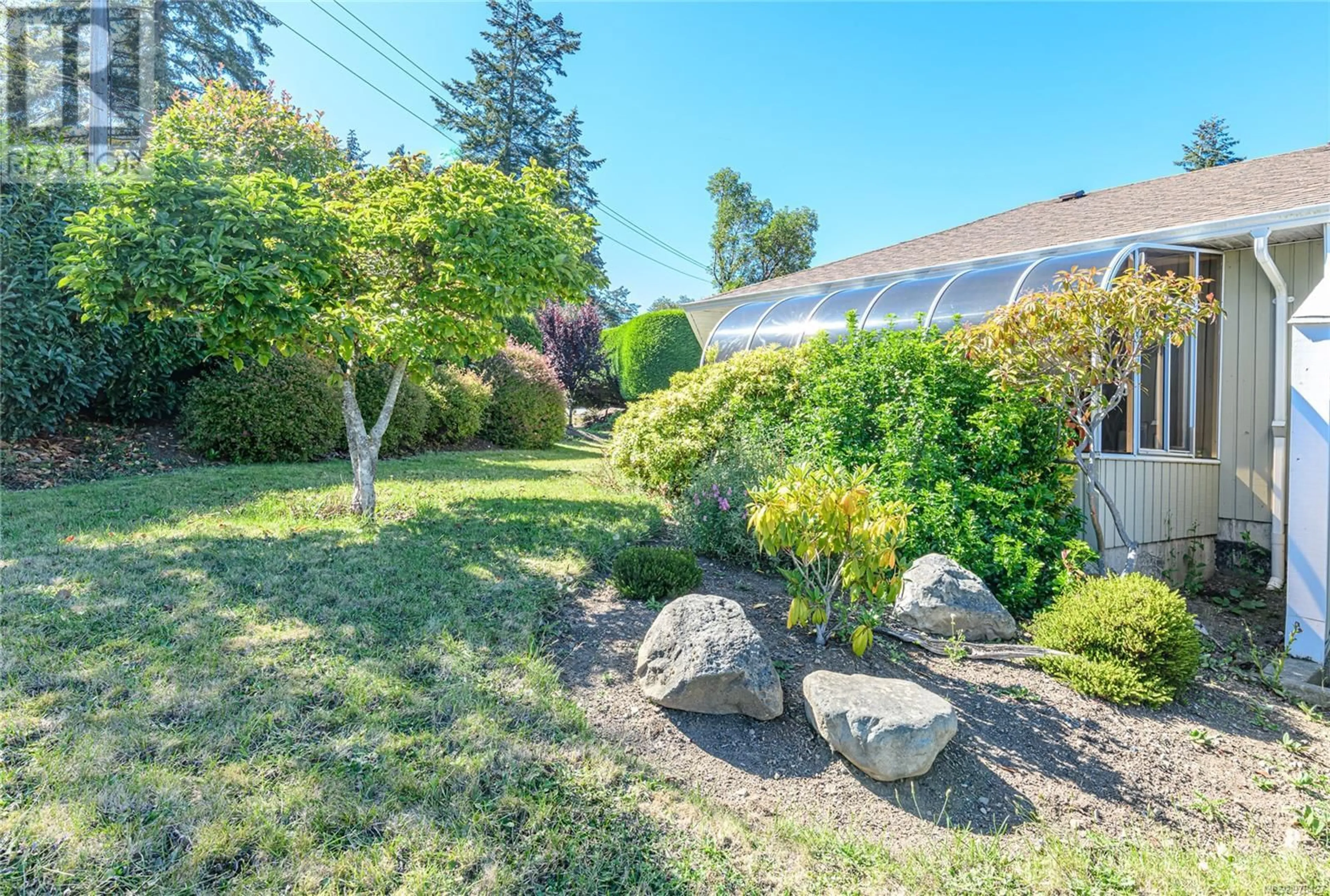 Patio, the fenced backyard for 11 130 Corbett Rd, Salt Spring British Columbia V8K1T2