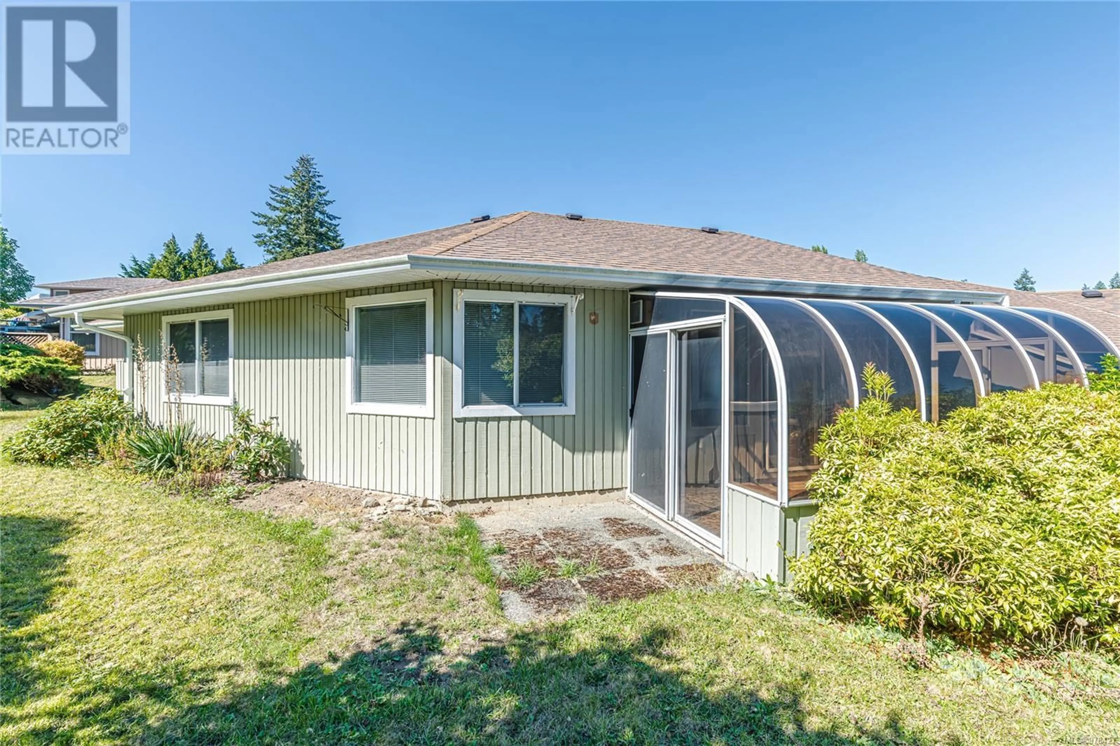 Frontside or backside of a home, the fenced backyard for 11 130 Corbett Rd, Salt Spring British Columbia V8K1T2