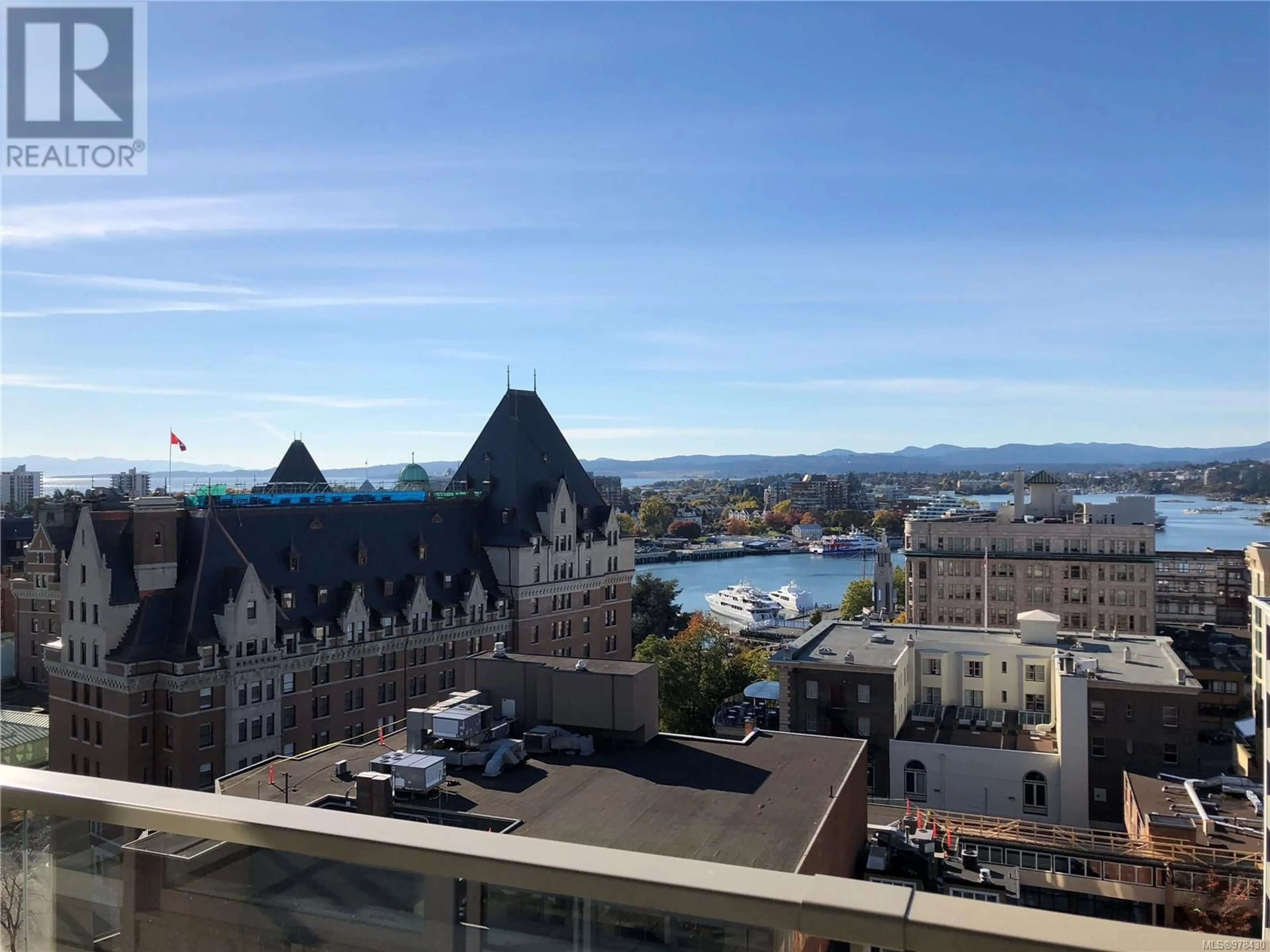 A pic from exterior of the house or condo, the view of city buildings for 1405 707 Courtney St, Victoria British Columbia V8W0A9