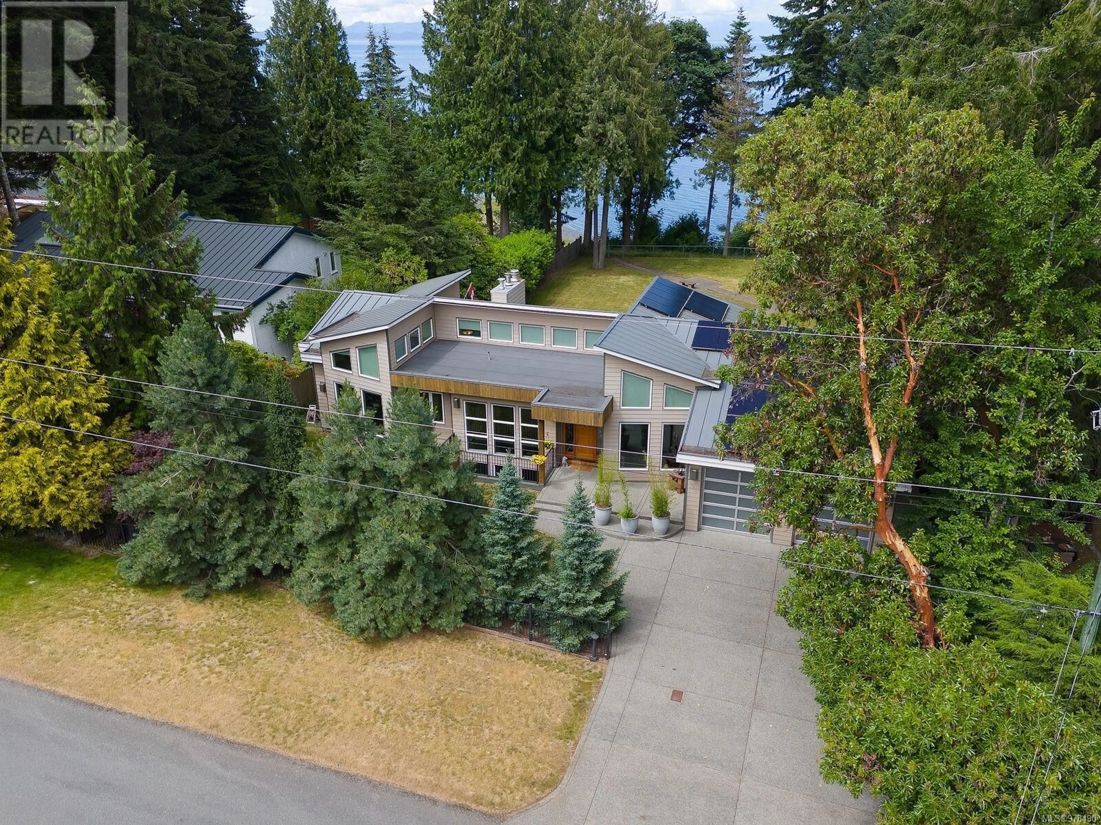 A pic from outside/outdoor area/front of a property/back of a property/a pic from drone, water/lake/river/ocean view for 5912 WALDBANK ROAD, Nanaimo British Columbia V9V1C8