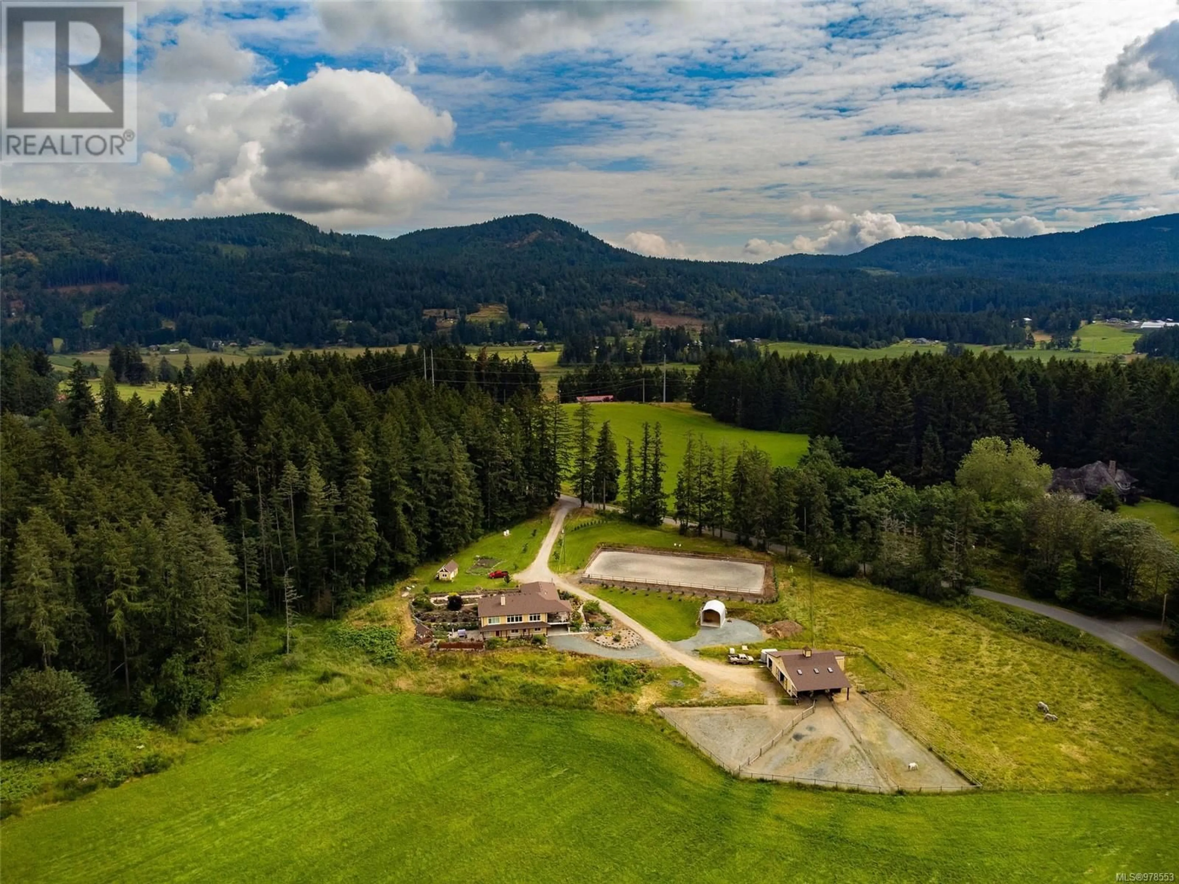 A pic from outside/outdoor area/front of a property/back of a property/a pic from drone, mountain view for 7000 Mays Rd, Duncan British Columbia V9L6A6