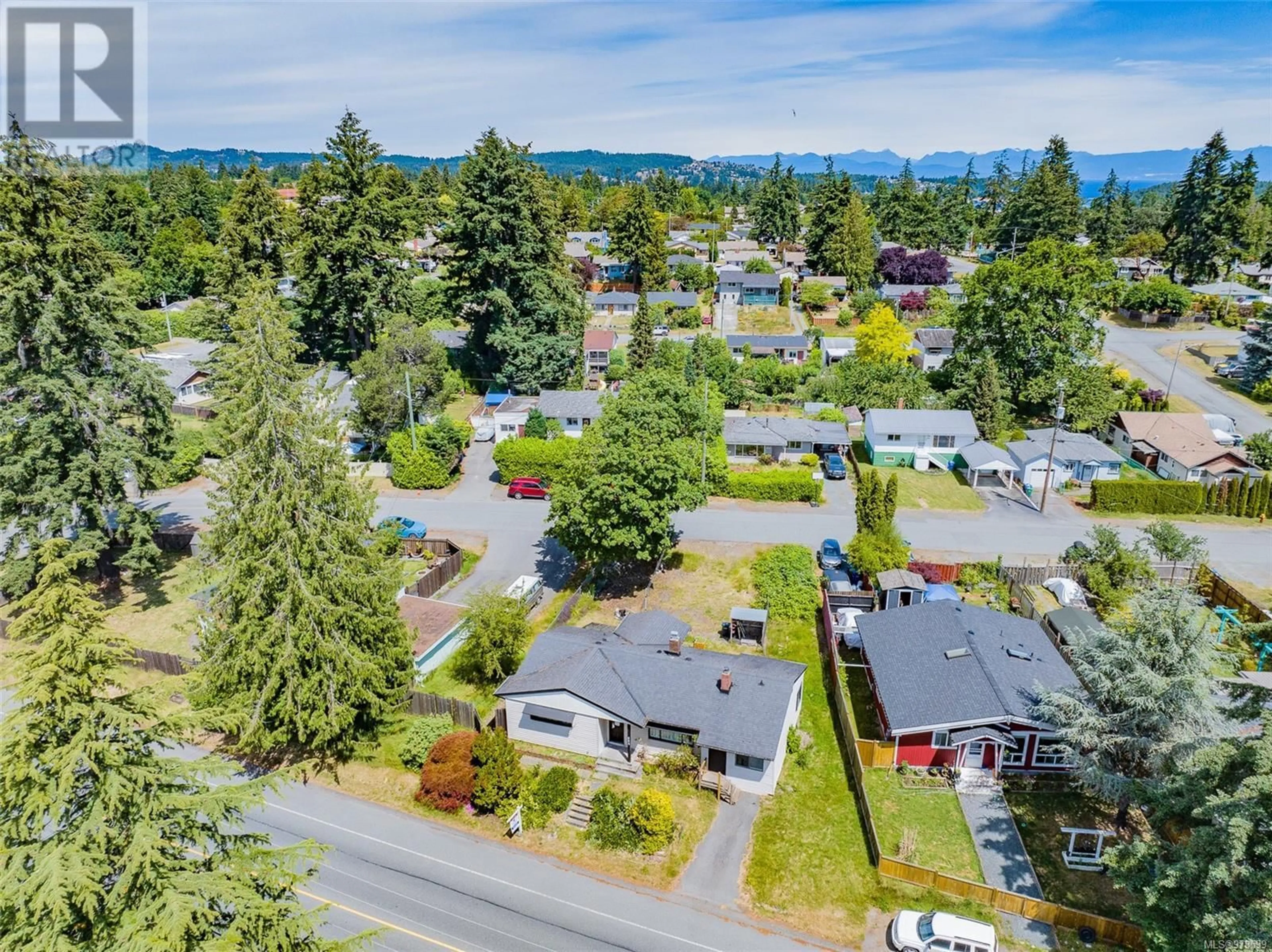 Frontside or backside of a home, the street view for 934 Townsite Rd, Nanaimo British Columbia V9S1M1